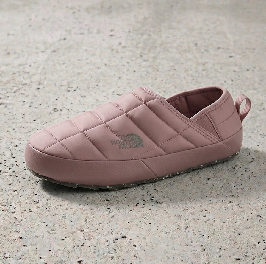 northface_mule_slipper_in_pink_at_milosport on a cement background