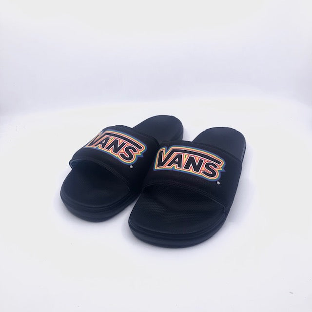 Vans La Costa Slides in Pride and Black featuring black and rainbow-colored strap, casual slip-on shoes for summer.