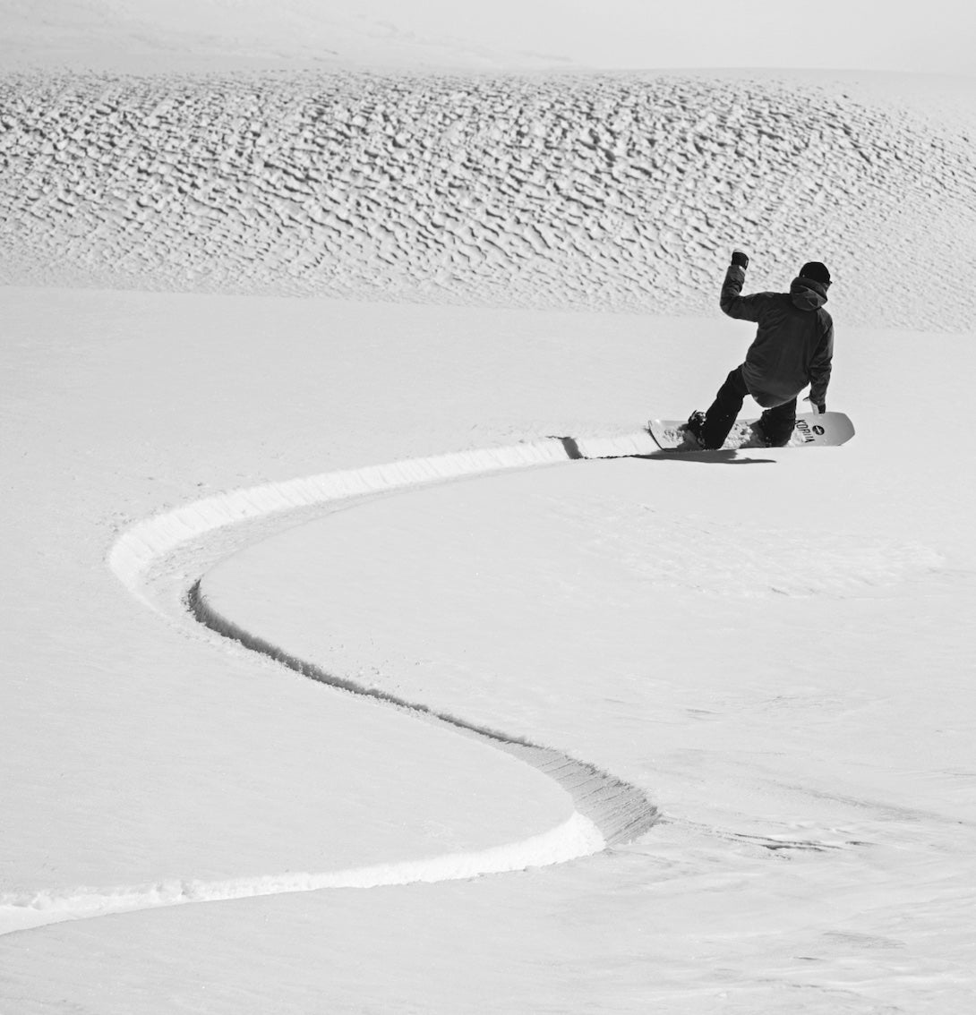 korua transition finder snowboard pic pow turns milosport black and white