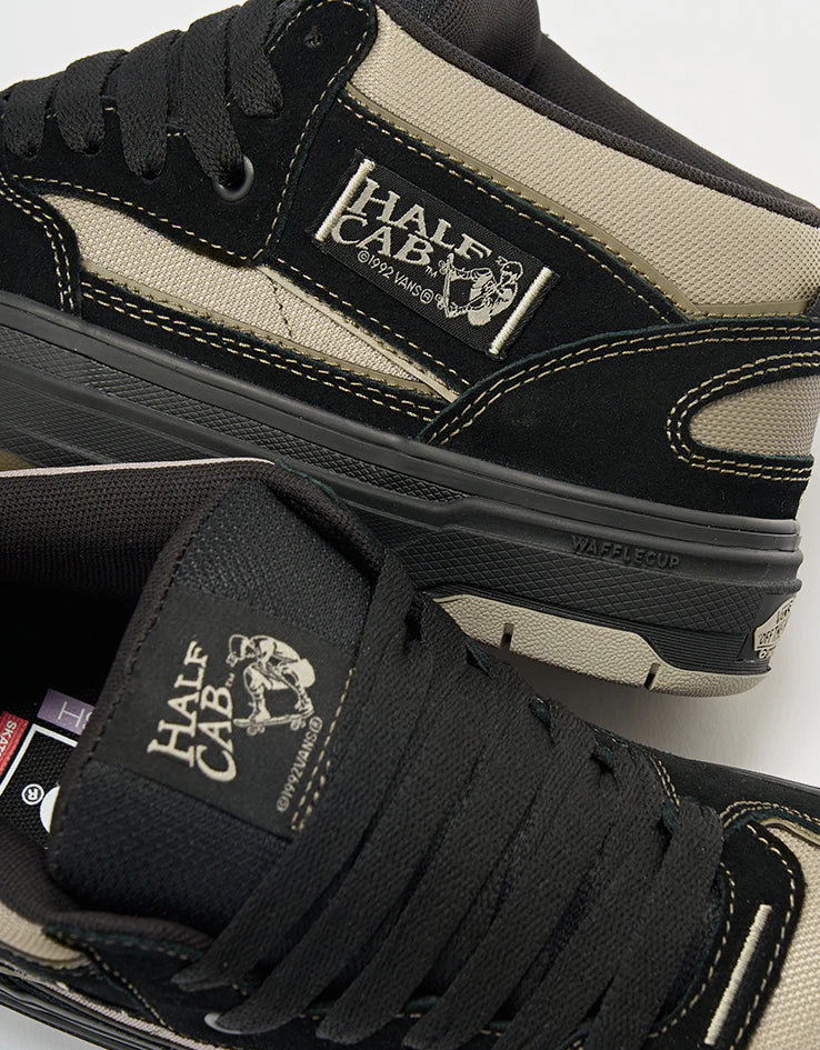 Vans Skate Half Cab Wafflecup shoes in black and peyote color, featuring classic skate shoe design and durable waffle sole.