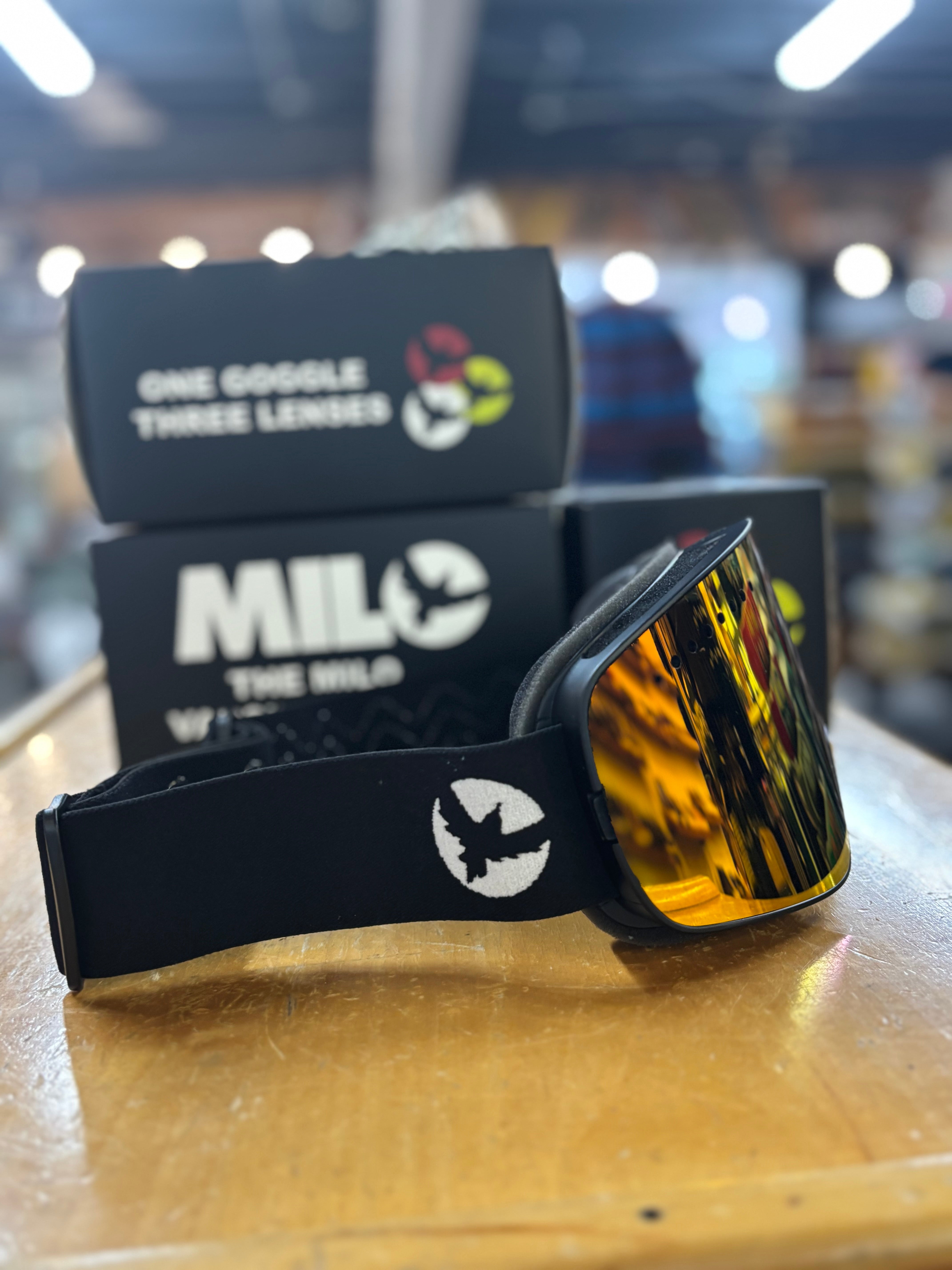 Milosport Varsity Goggle in a Black Frame with a Yellow Replacement Lens and a Clear Replacement Lens