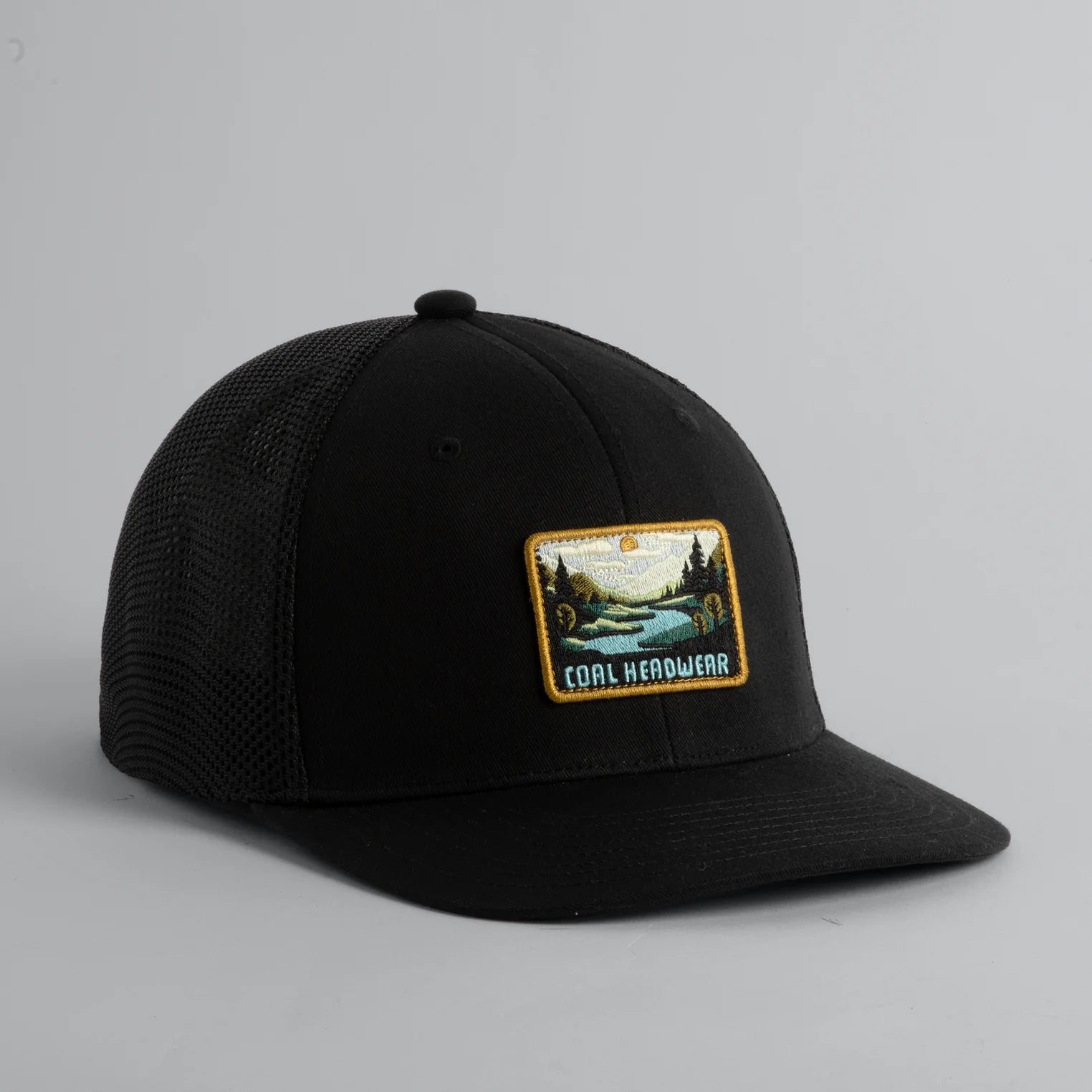 Men's Coal Low Insulated Hat with a black exterior, designed for warmth and comfort during cold weather.