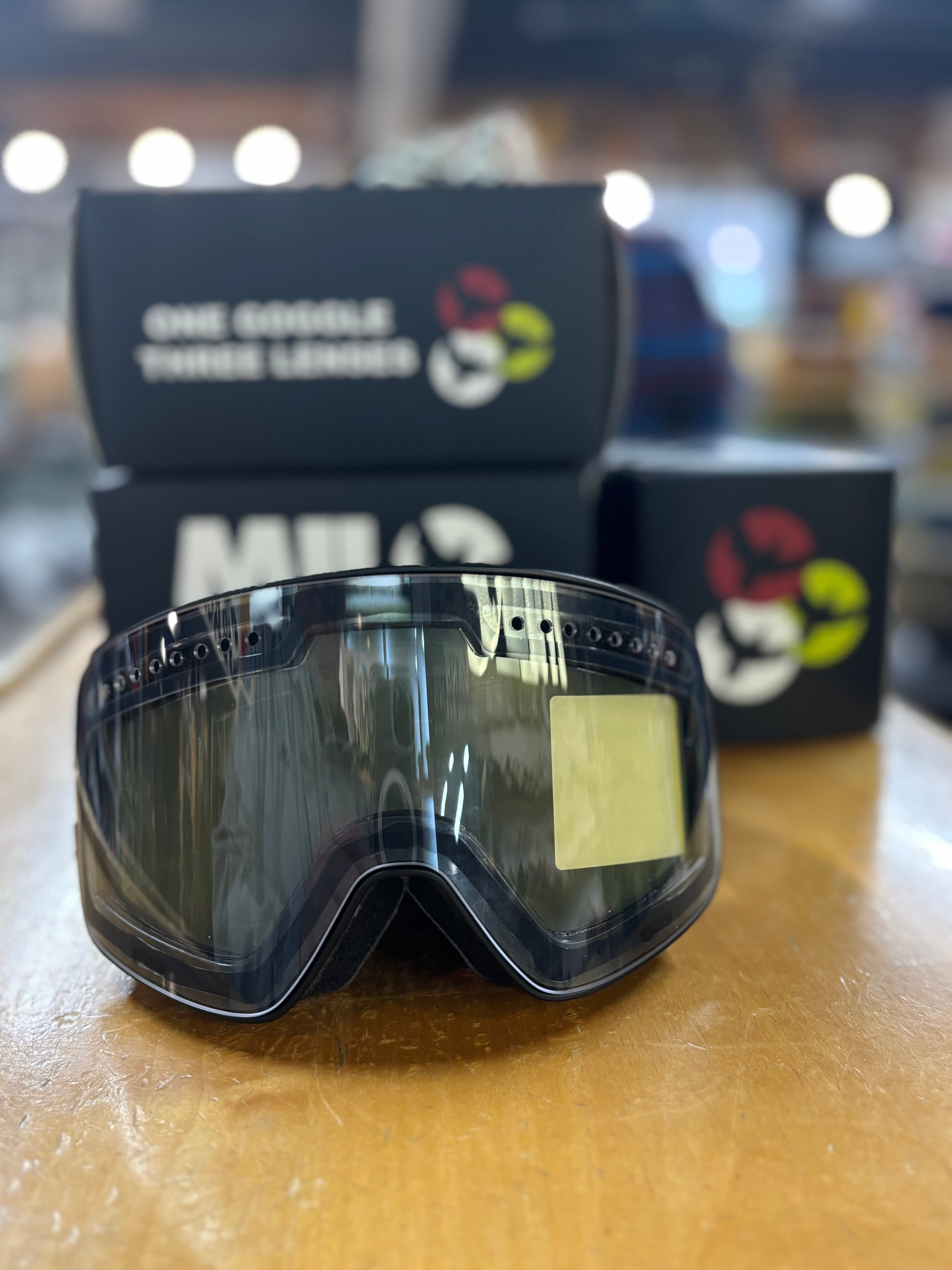 Milosport Varsity Goggle in a Black Frame with a Yellow Replacement Lens and a Clear Replacement Lens