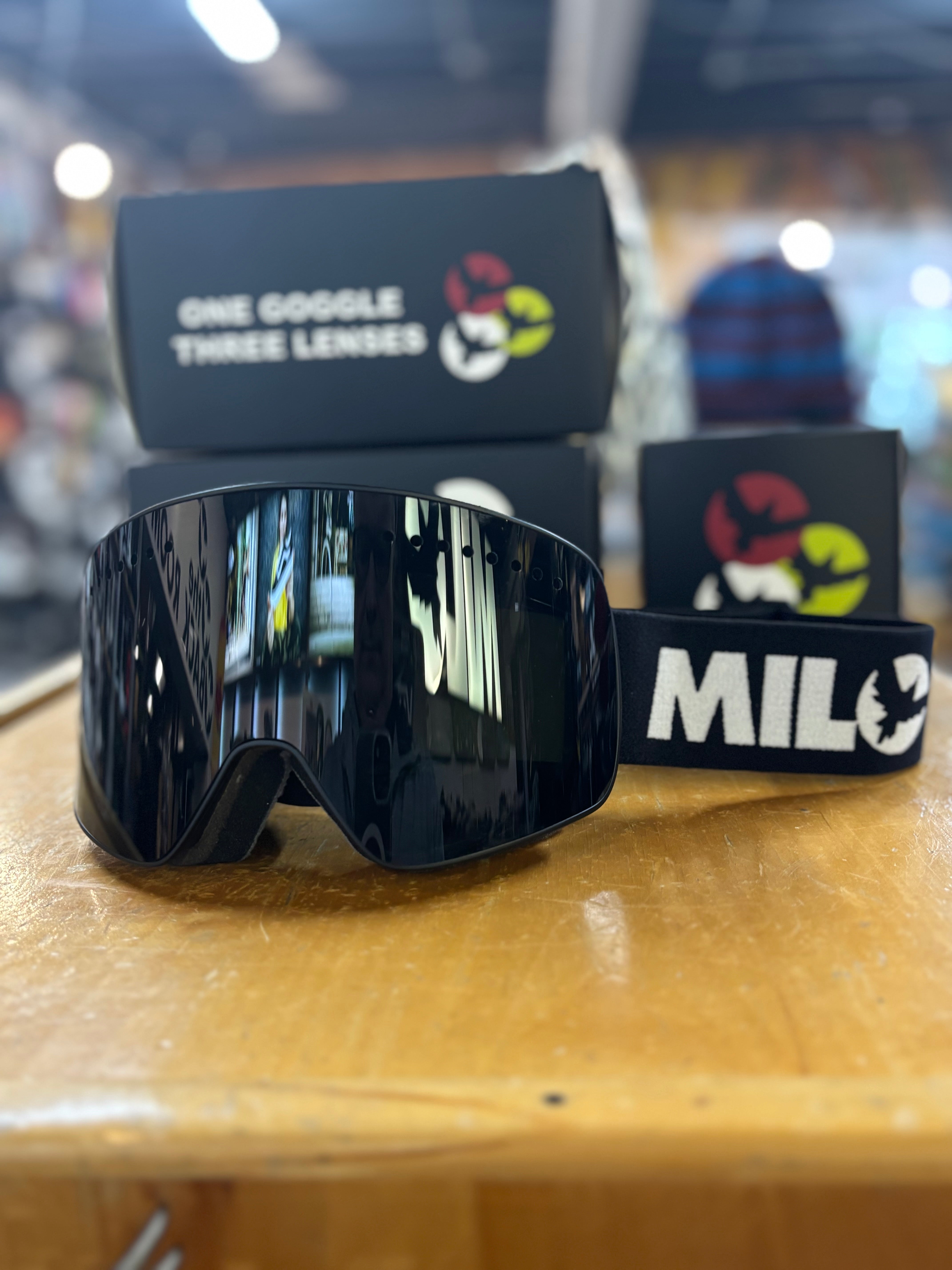 Milosport Varsity Goggle in a Black Frame with a Yellow Replacement Lens and a Clear Replacement Lens