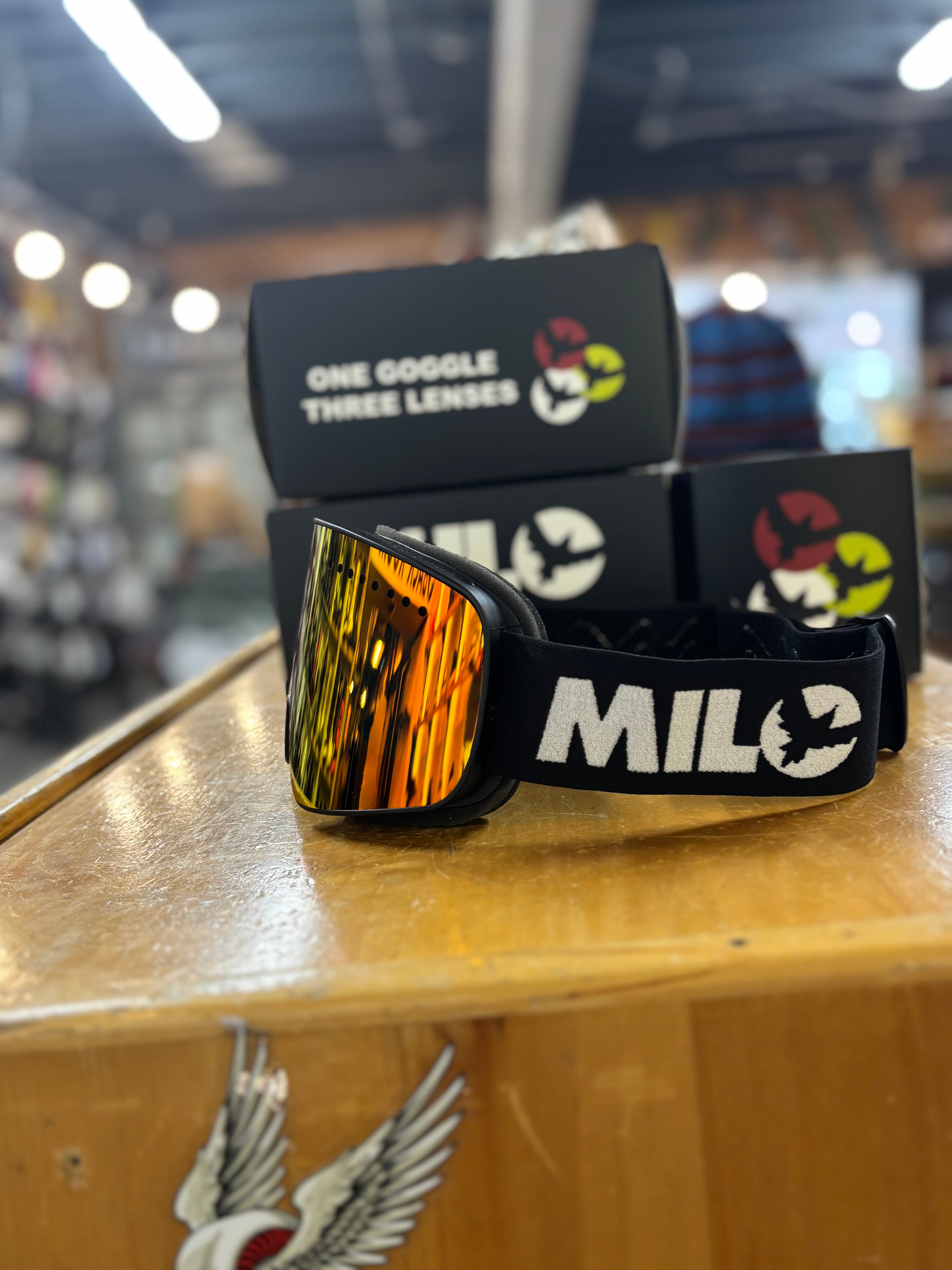 Milosport Varsity Goggle in a Black Frame with a Yellow Replacement Lens and a Clear Replacement Lens