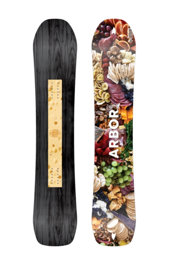 Arbor Danny Kass Park Pro snowboard on snow, showing the board's design and graphics for the 2027 model.