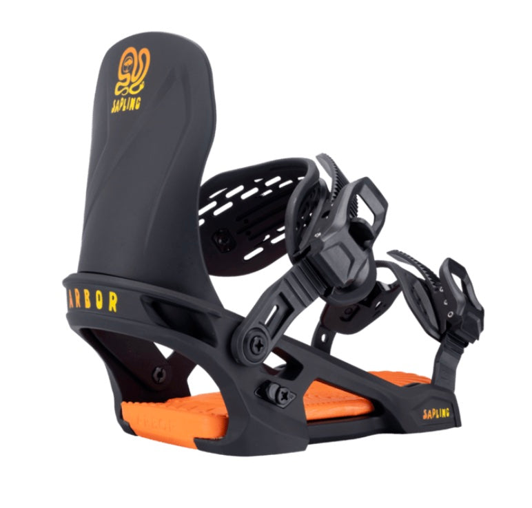 Arbor Sapling snowboard bindings mounted on a snowboard, featuring adjustable straps and high-back design for snowboarding.