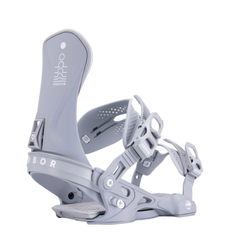 Arbor Sequoia snowboard bindings on a snowboard, featuring black straps and high-back support for winter snowboarding.