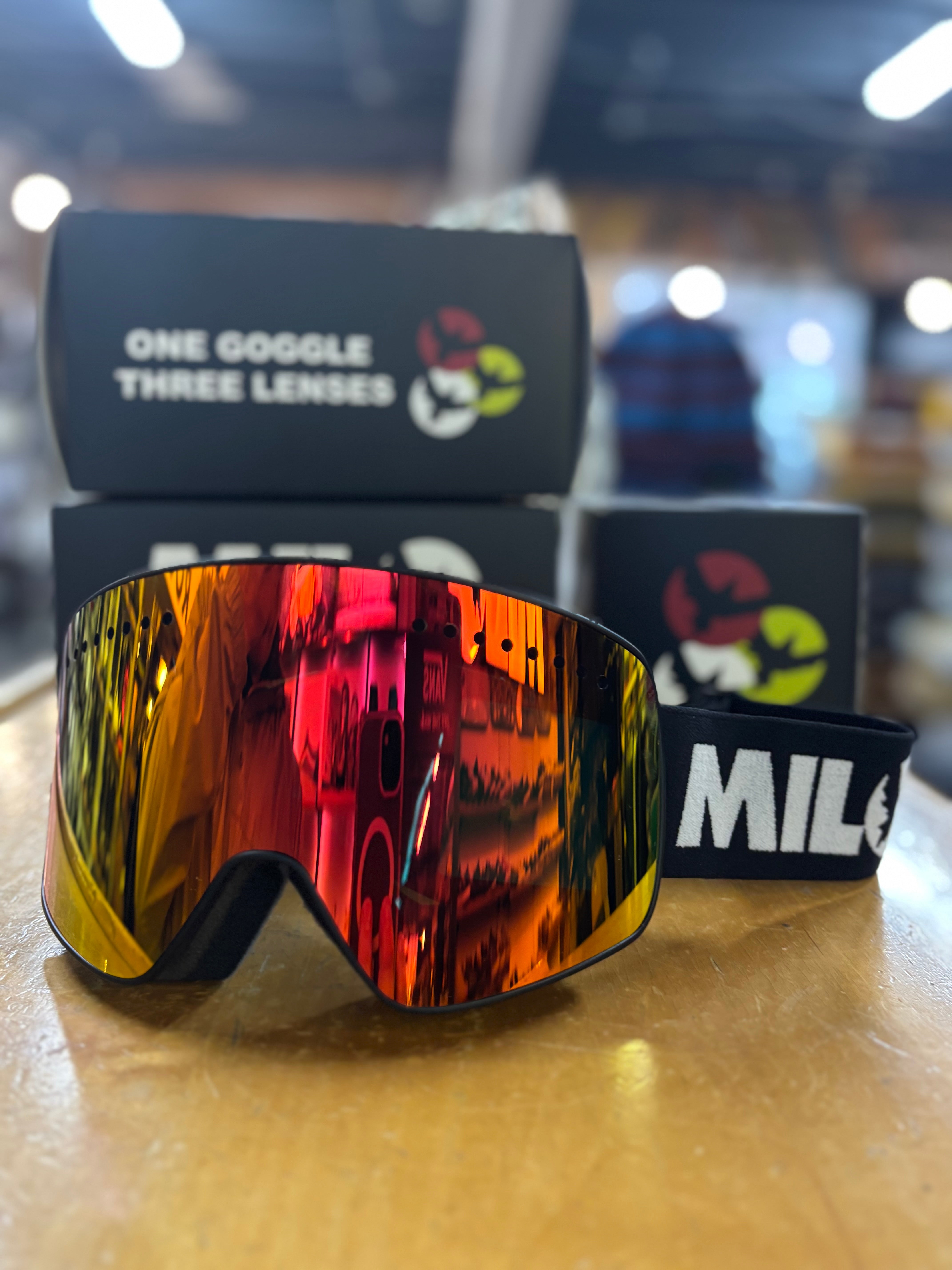 Milosport Varsity Goggle in a Black Frame with a Yellow Replacement Lens and a Clear Replacement Lens