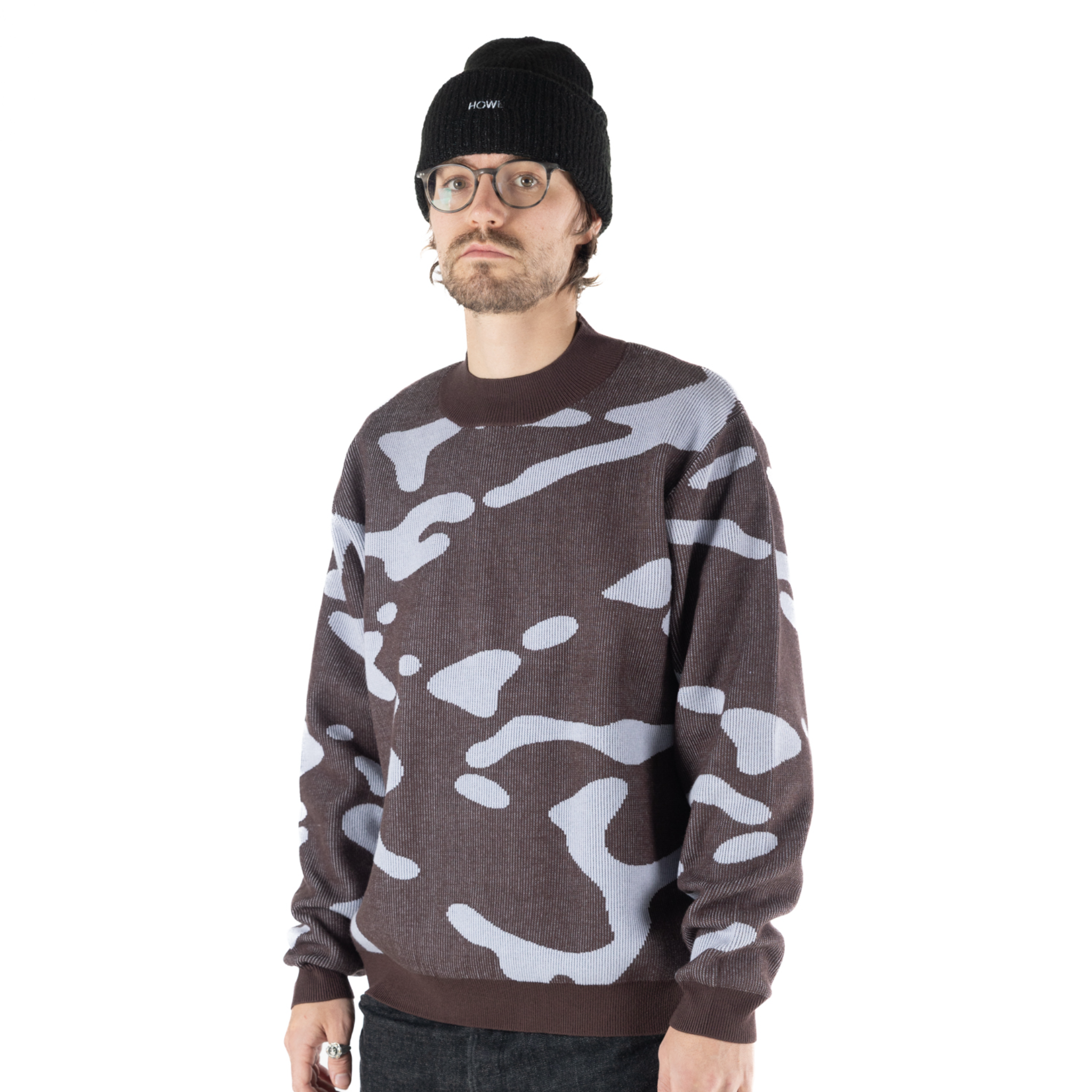 Brown Howl Heavy Knit Crew sweatshirt worn by a male model, showcasing a cozy heavyweight knit design for men.