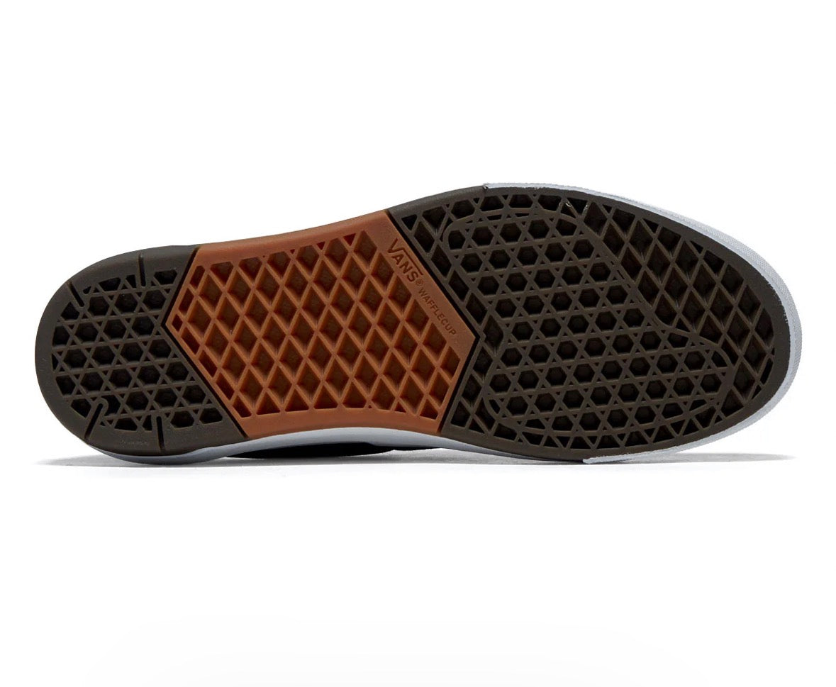 Vans Skate Era Wafflecup shoes in black and white, featuring classic skate shoe design with waffle outsole and Vans branding.