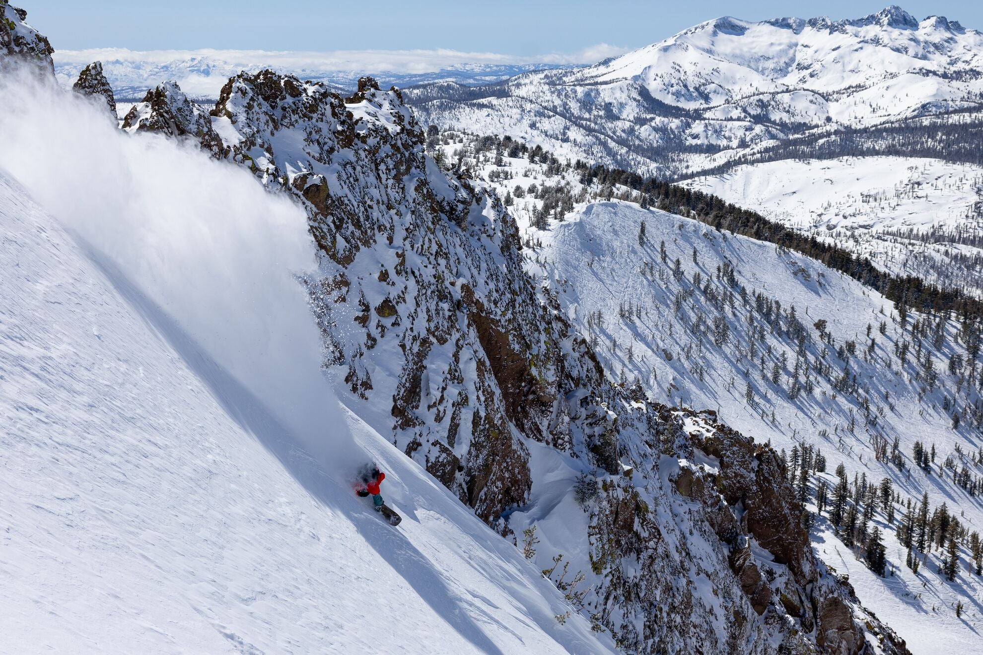 Jones Freecarver 9000 S snowboard in action on snow, showing its sleek design and sporty profile for 2027 winter snowboarding.