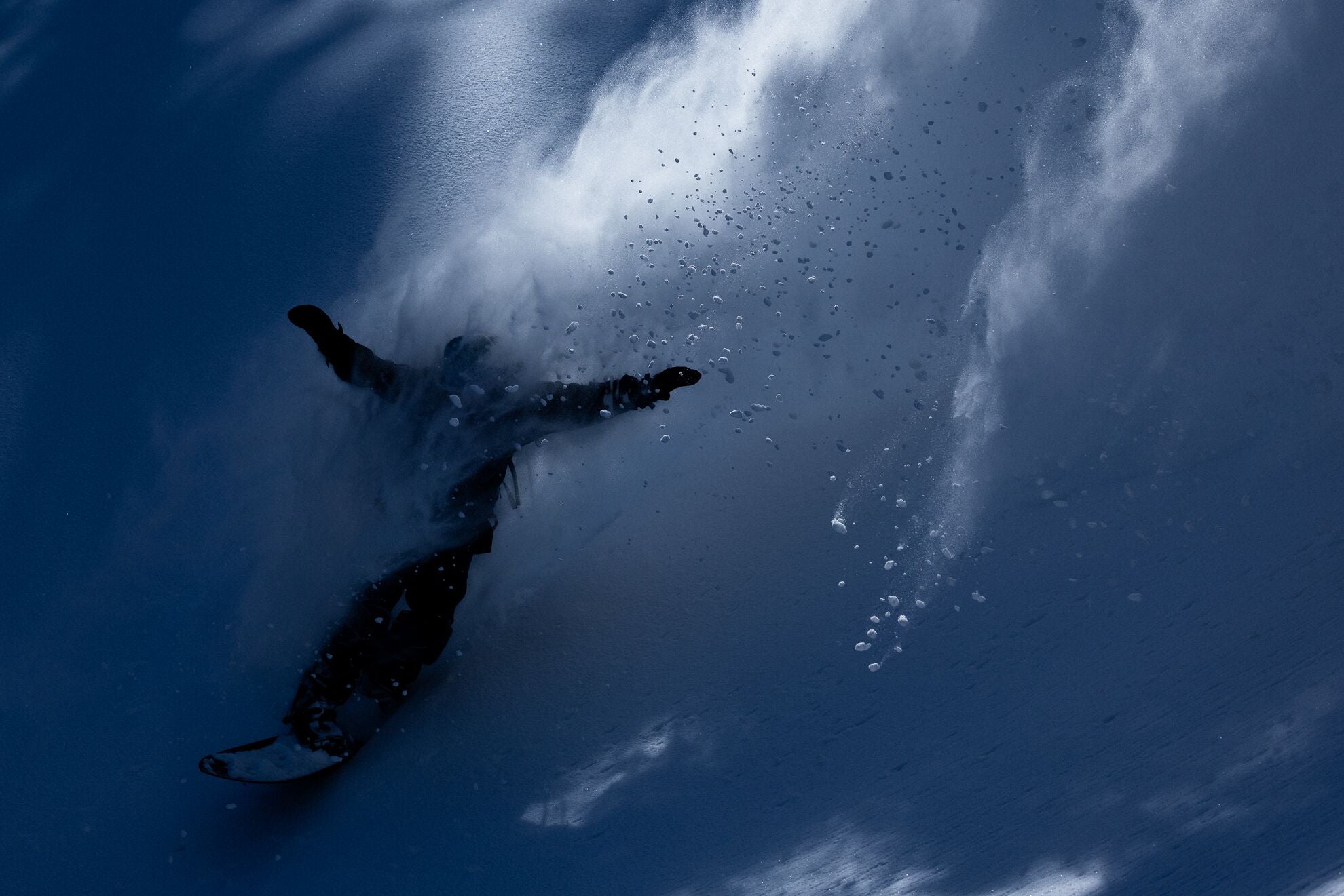 Jones Men's Flagship Pro snowboard in action, showcasing its design and length for versatile snowboarding performance.