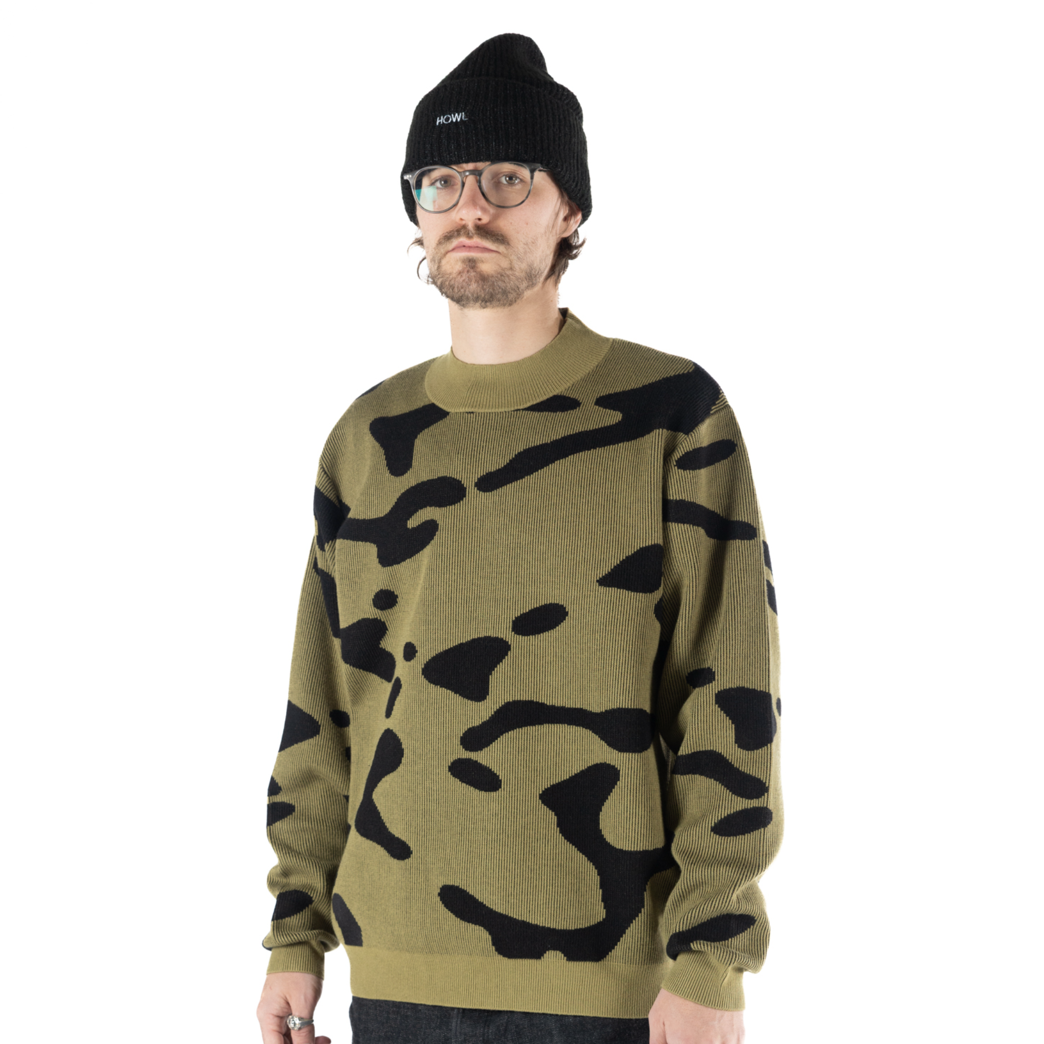 Black Howl Heavy Knit Crew sweatshirt worn by a male model, showcasing its midweight knit fabric and casual style.