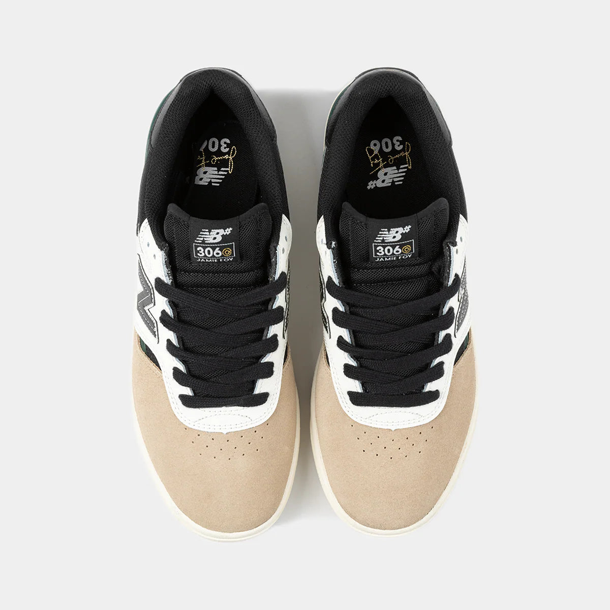 New Balance Numeric 306 Cup Foy skate shoes in beige and black, featuring durable skate shoe design and classic branding.
