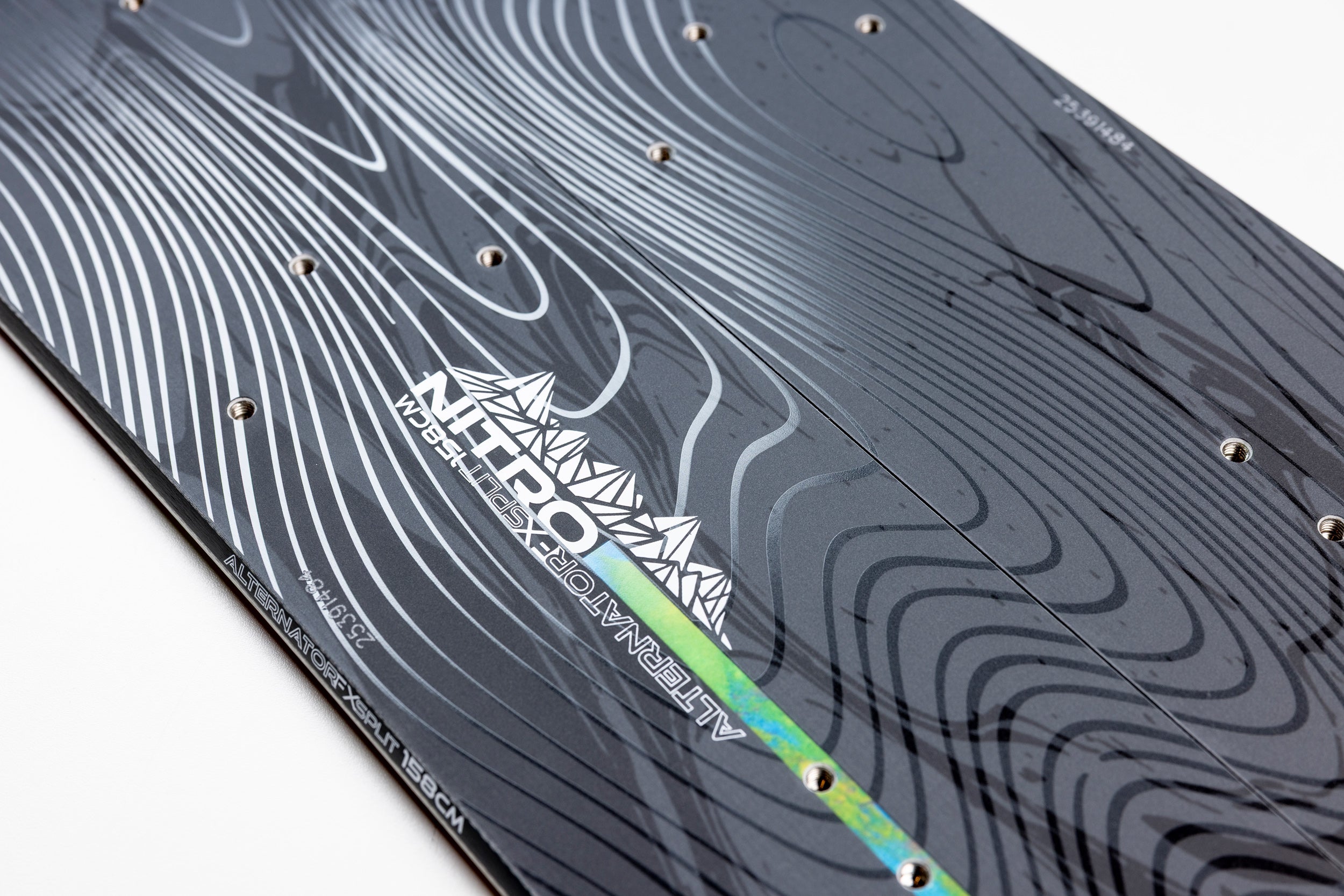 Nitro Alternator FX split snowboard in snow, featuring Nitro logo and design elements for 2027 outdoor snowboarding adventures.