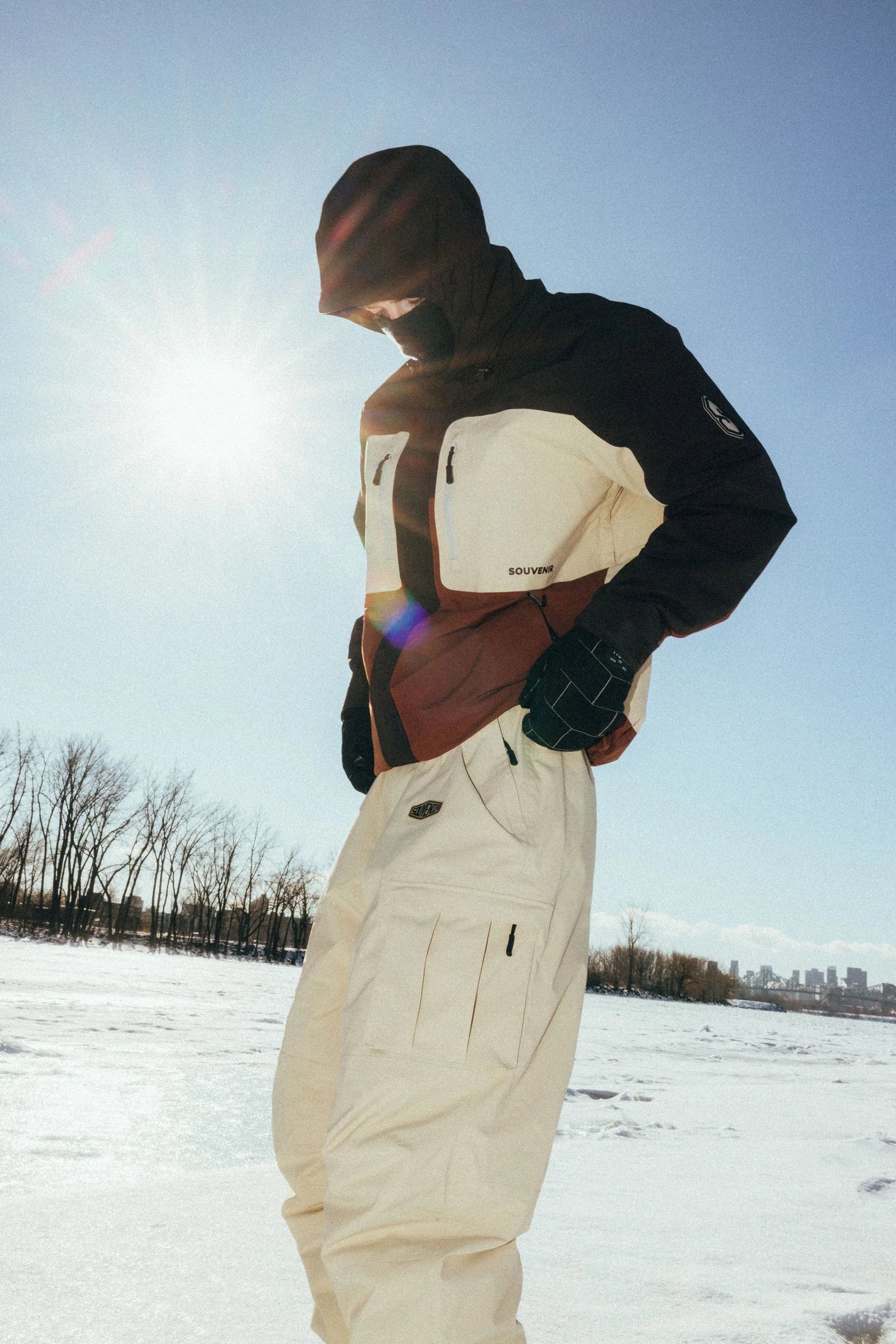 Men's Souvenir S2000 Insulated Jacket in chocolate color, showcasing the warm, padded design with a sleek fit and branded logo.