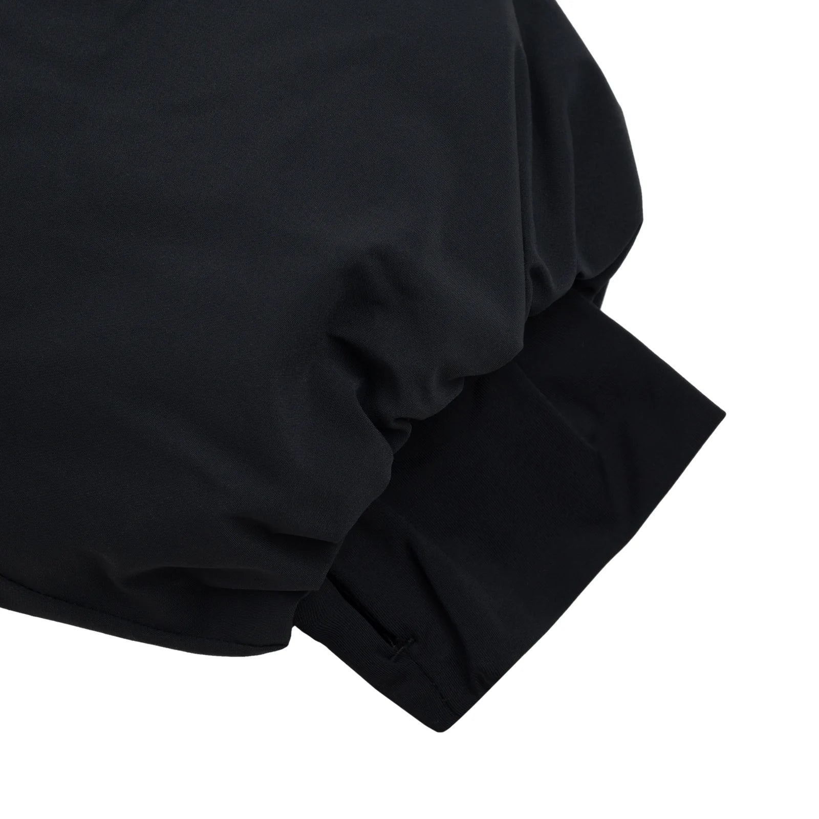 Black Souvenir snowboard parka with detailed cuffs, designed for winter sports and cold weather conditions.
