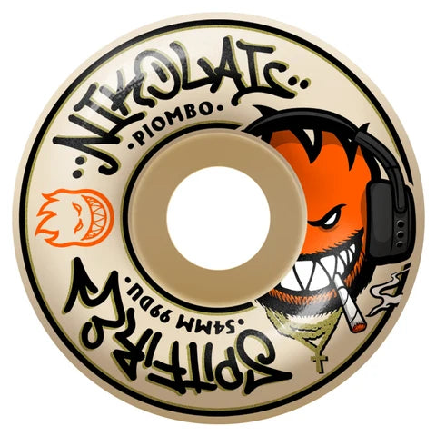 A single skateboard wheel with a cream-colored urethane body, featuring black text that reads 'NICHOLAS PIOMBO' and 'SPITFire', along with an orange cartoon character wearing headphones and smoking a cigarette.