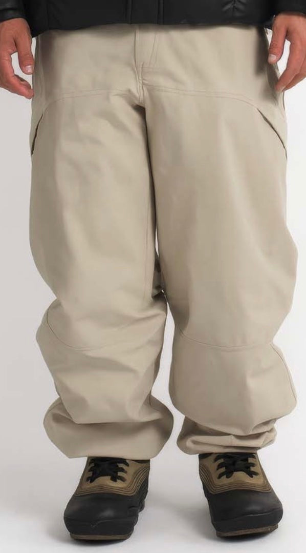 Autumn Shadow 3L Snow Pant for men and women, showing a sleek black waterproof ski pant with adjustable waistband and snow gaiters.