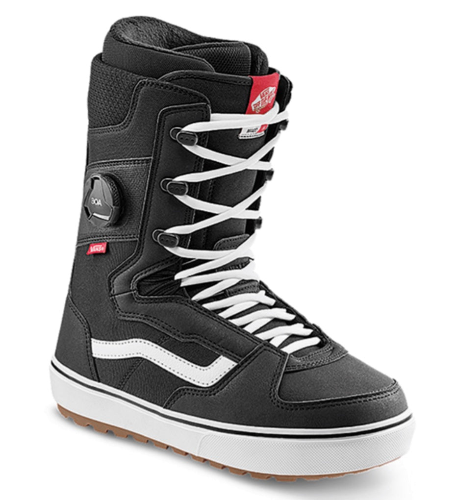 Vans Invado OG snowboard boot in black and white, showcasing the padded design, lacing system, and rugged sole for snowboarding.