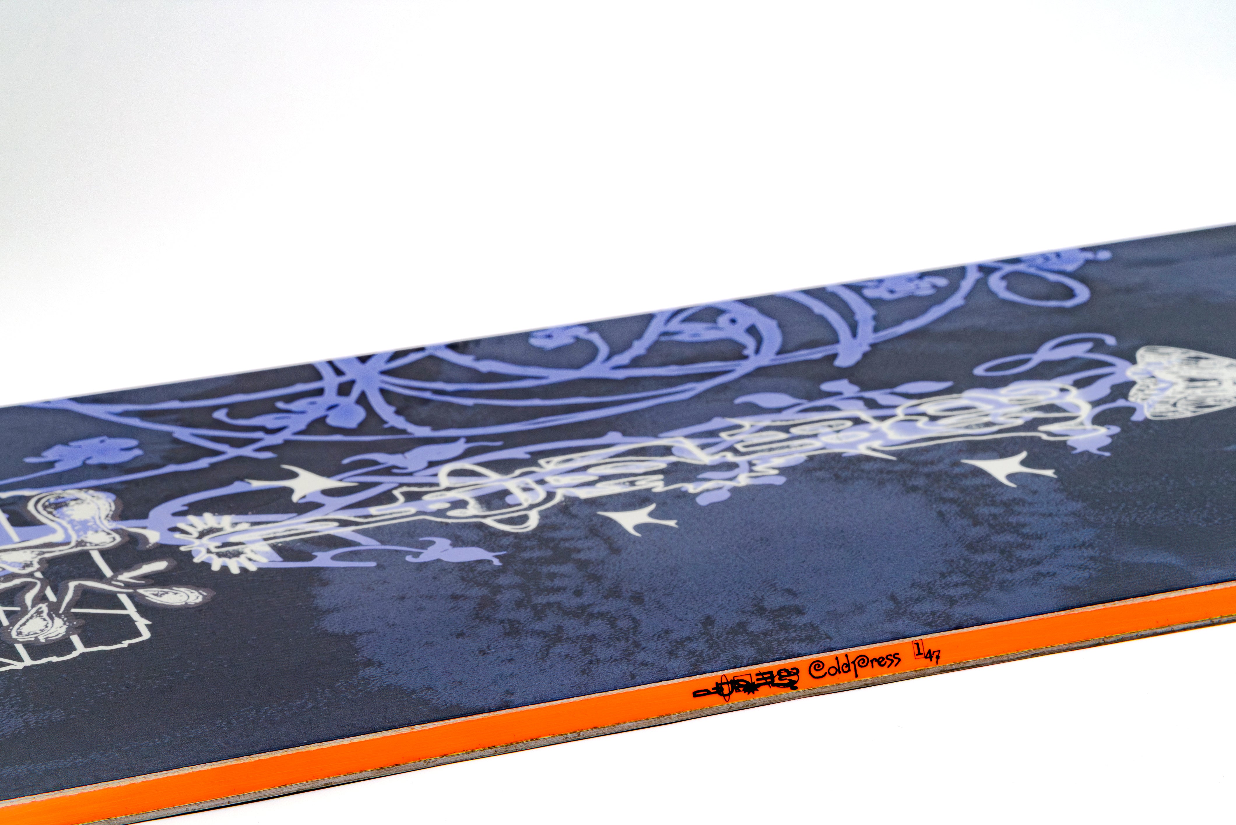Armada Cold Press Women's Snowboard with sidewall design, showcasing its sleek shape and construction for winter snowboarding.