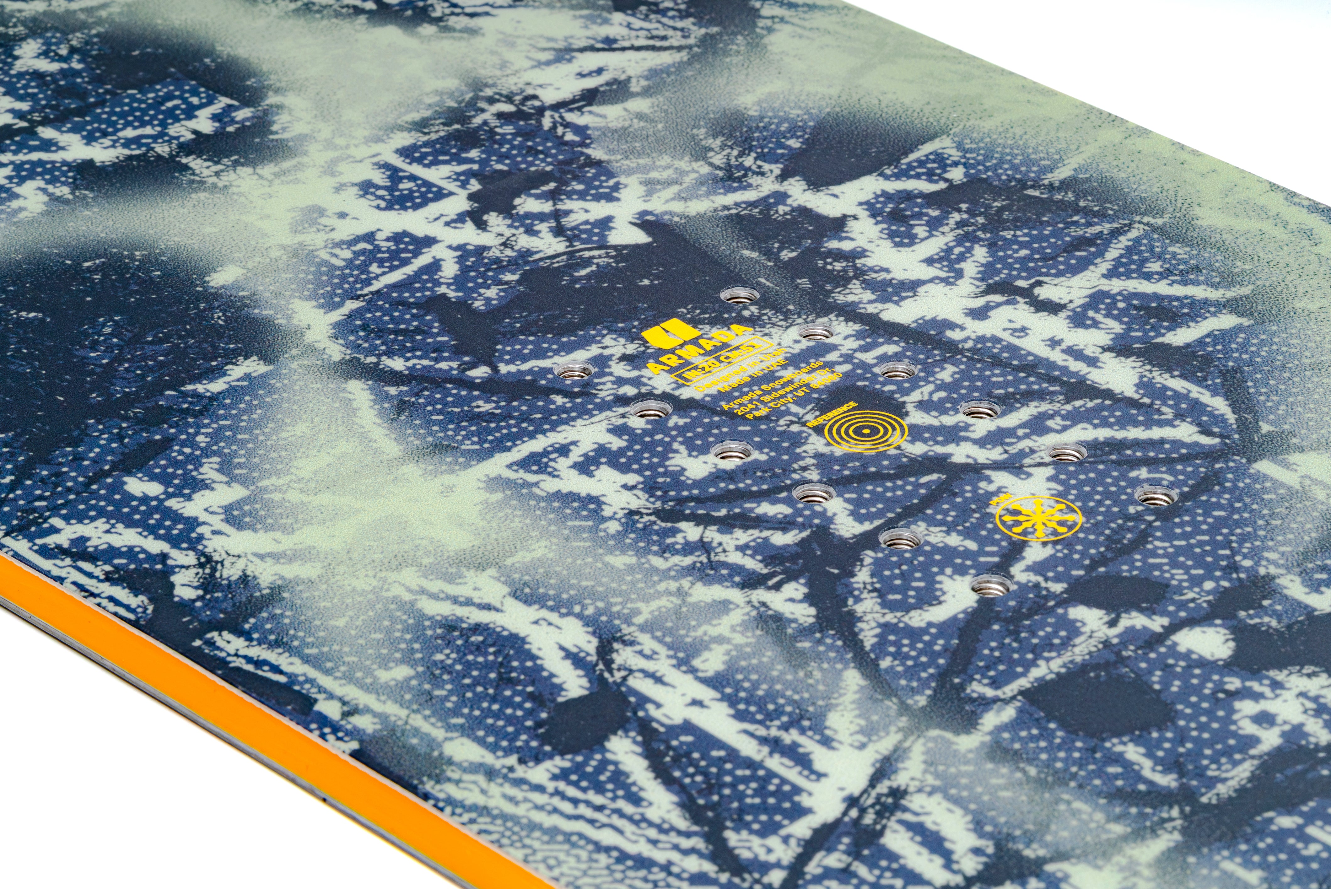 Armada Kure women's snowboard with insert holes, designed for snowboarding in winter conditions, featuring a sleek design.