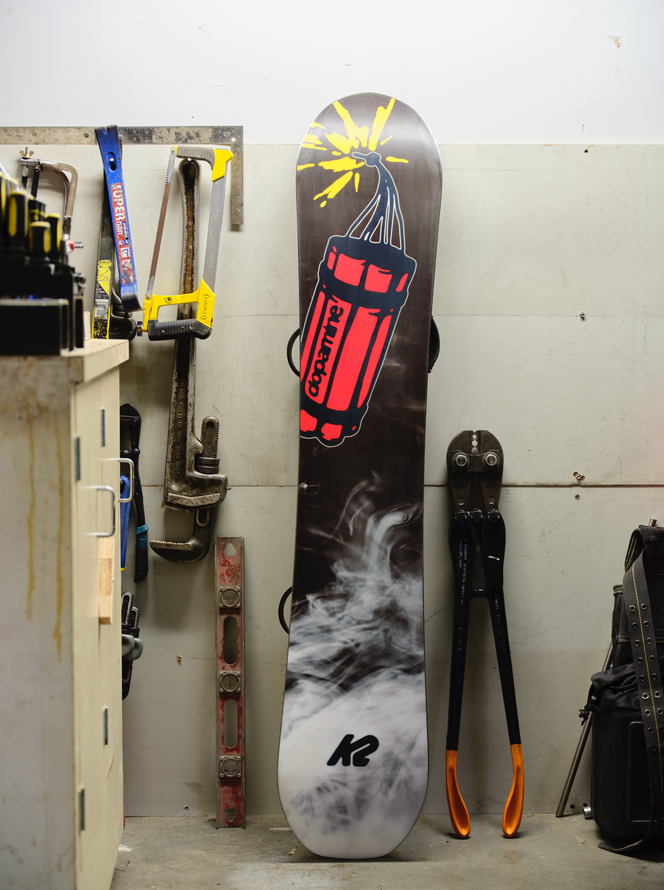 K2 Antidote snowboard base with tuning details, showcasing the K2 snowboard designed for snowboarding enthusiasts.