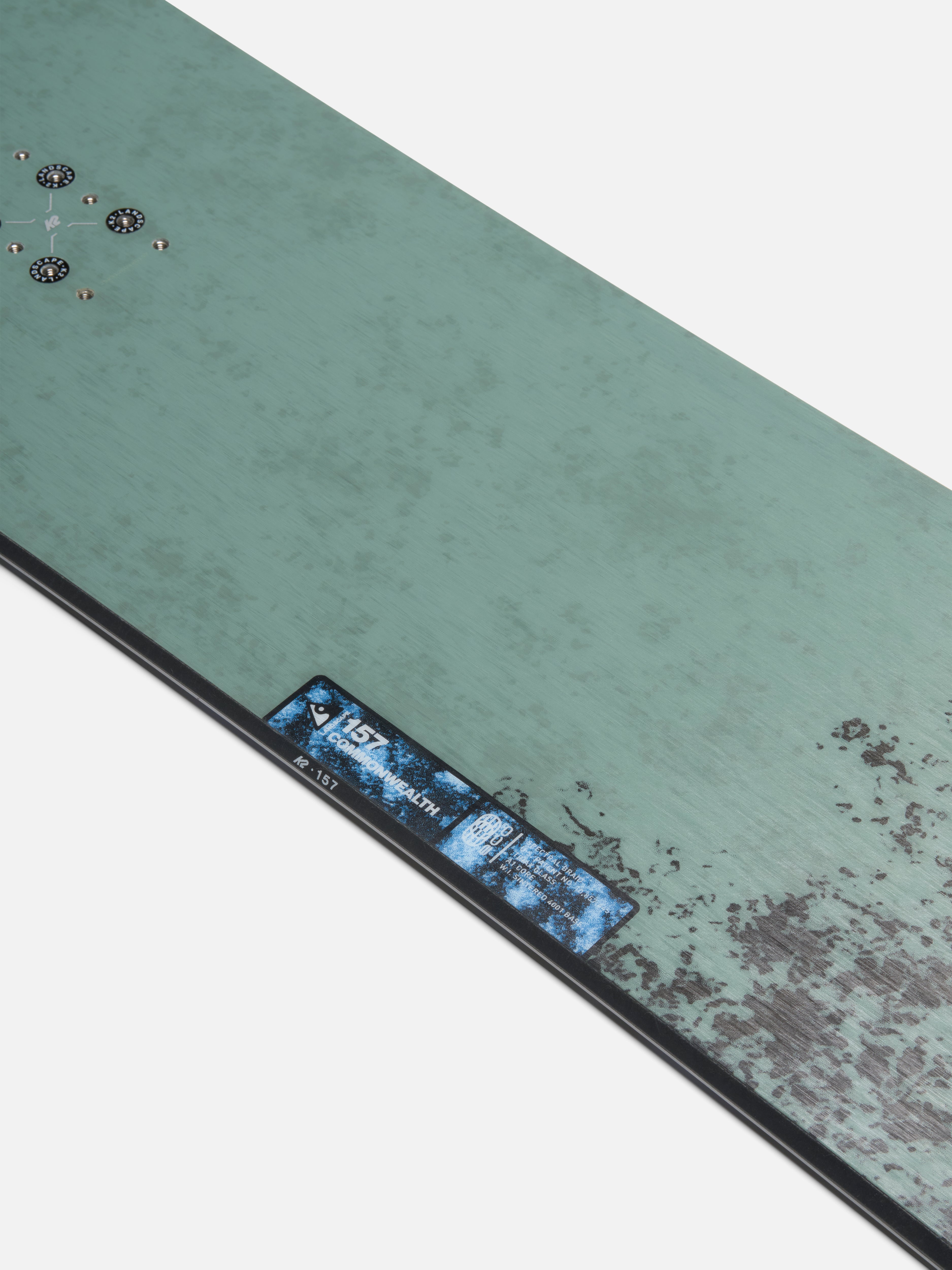 K2 Commonwealth snowboard for 2027, showing the center view with a sleek design and graphics suitable for snowboarding enthusiasts.
