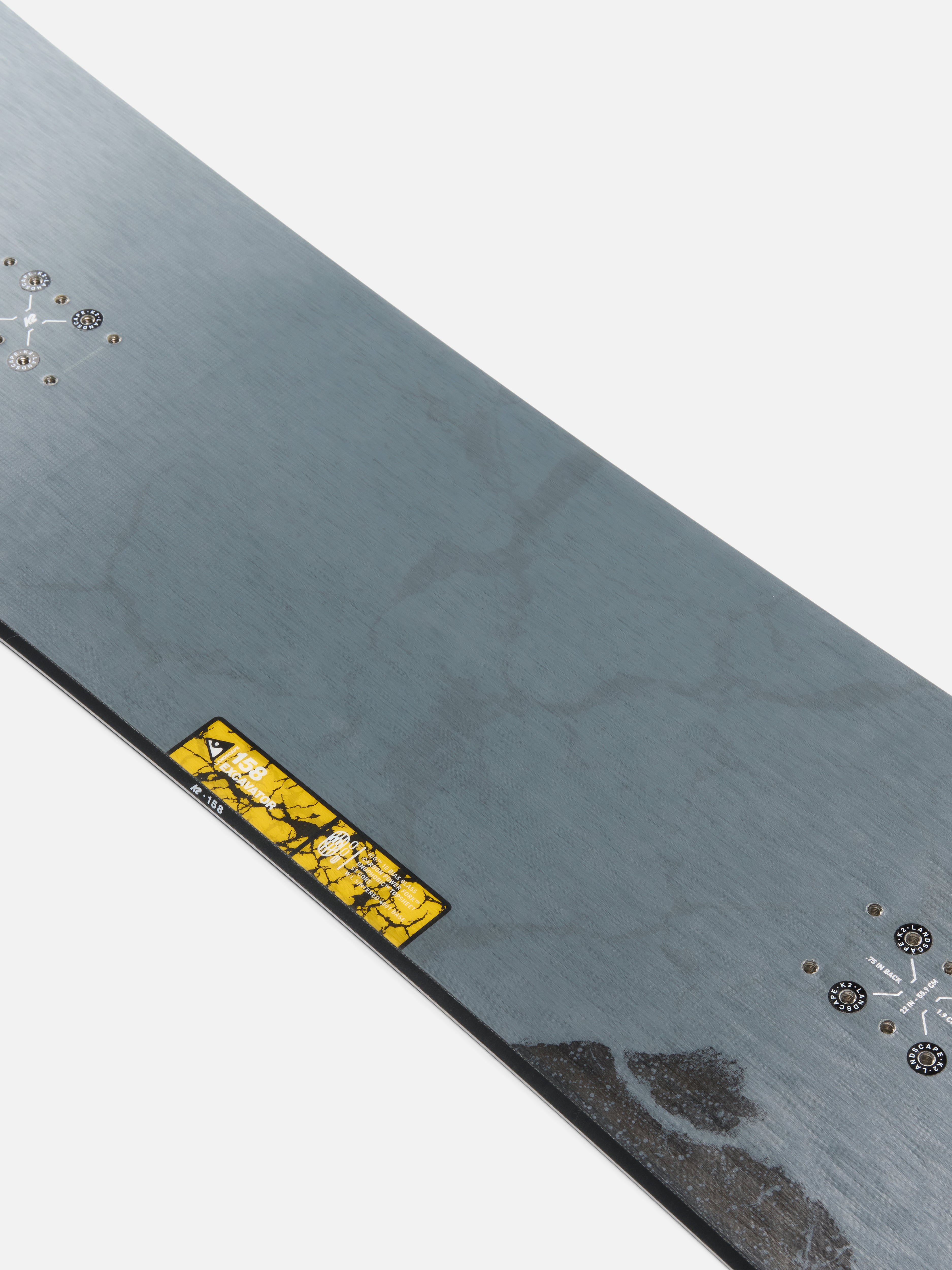K2 Excavator Snowboard 2027, center view showing the snowboard with bold graphics and K2 branding for winter snowboarding.