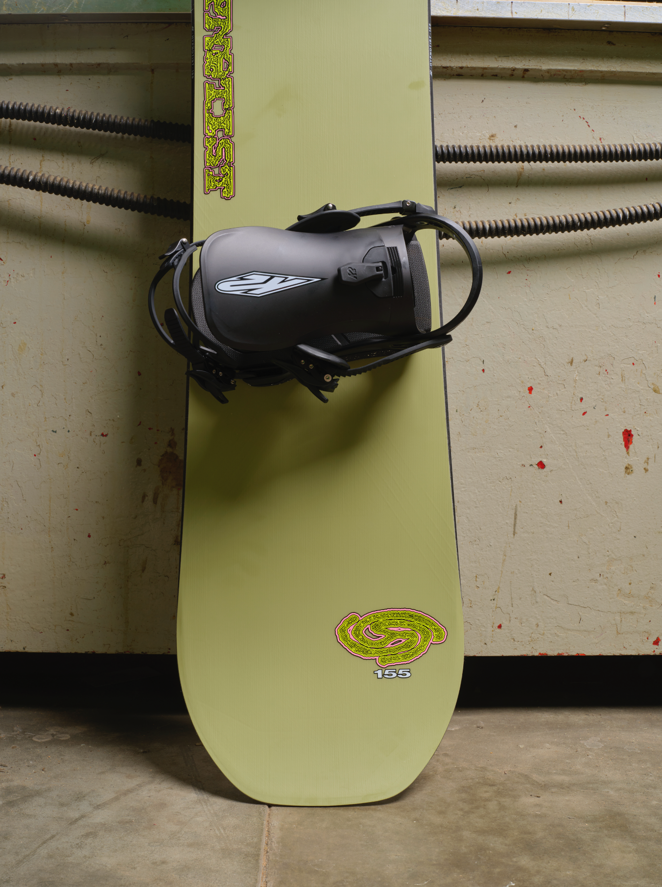 K2 Hypnotist snowboard 2027 with snowboard tail design, showcasing the K2 brand logo and detailed graphic artwork.