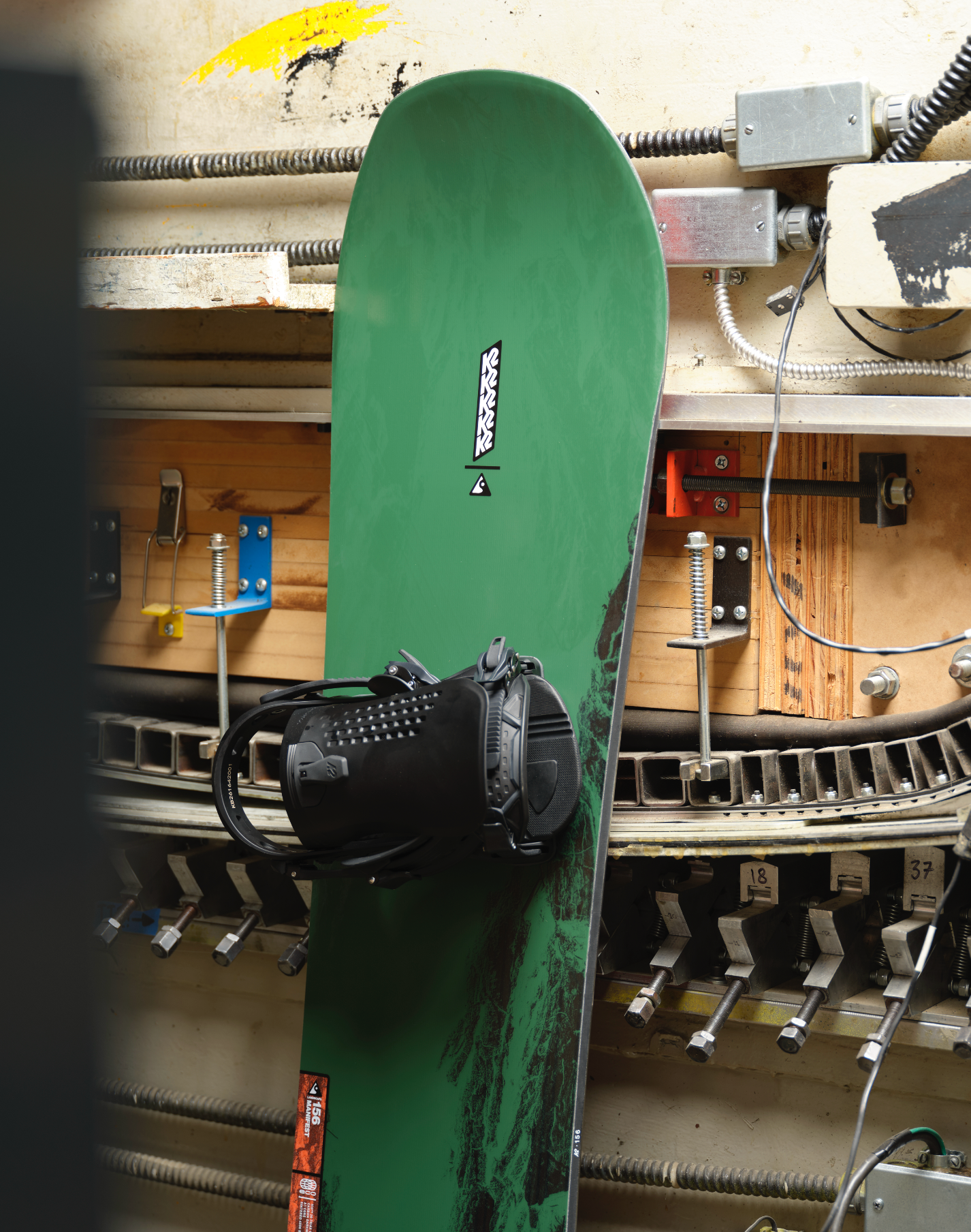 K2 Manifest Snowboard 2027 with nose design, showcasing the K2 brand and detailed graphics on the snowboarding surface.