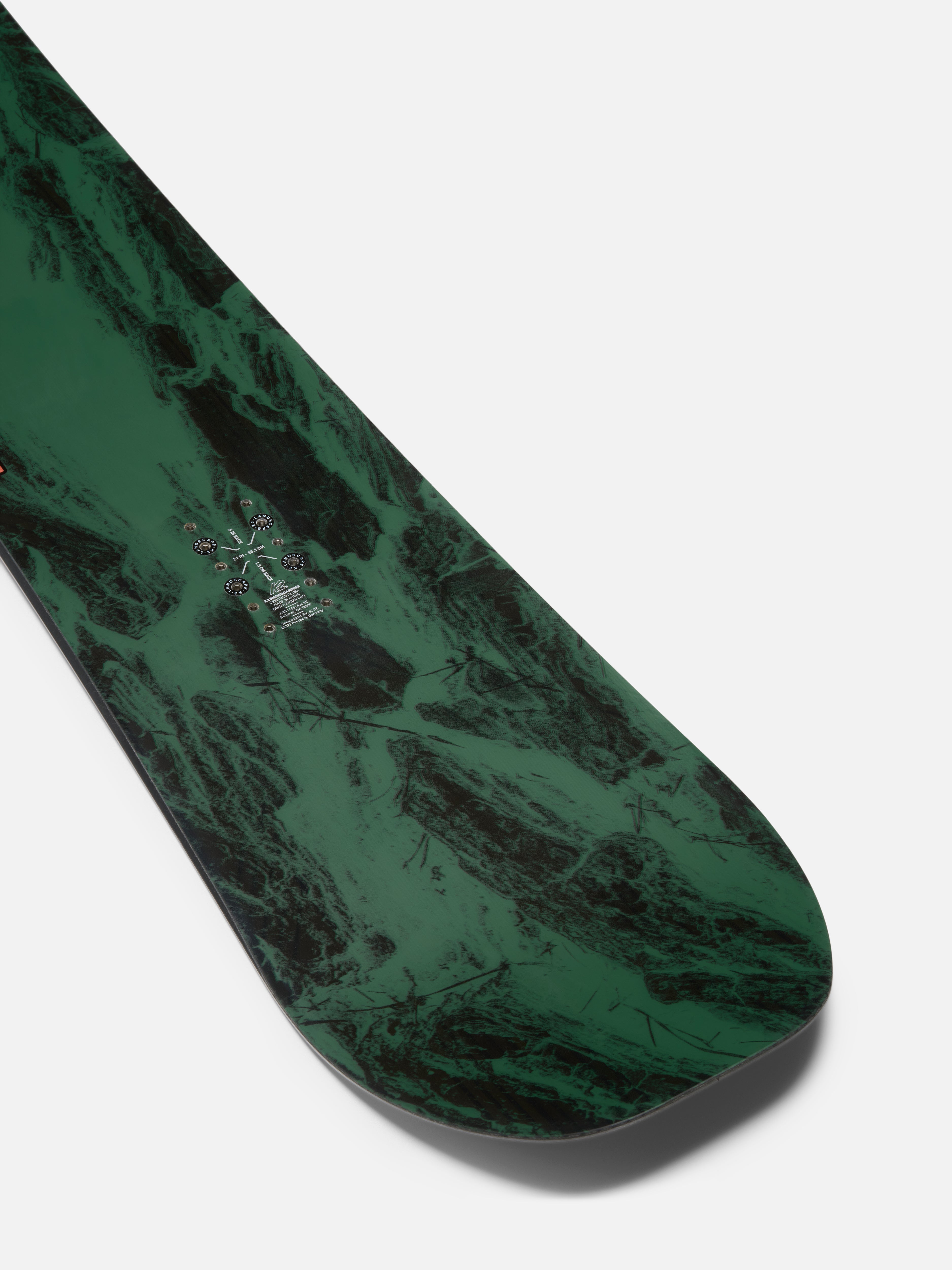 K2 Manifest snowboard with black tail design and graphics, suitable for all-mountain snowboarding, from the 2027 K2 snowboarding collection.