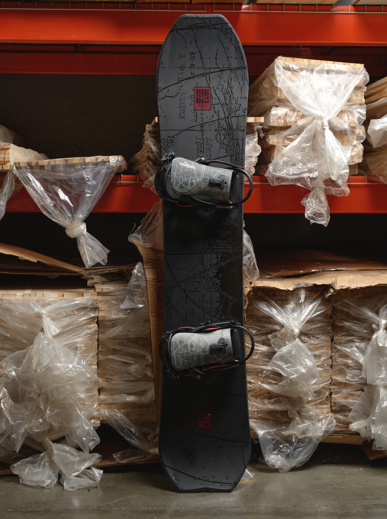 K2 Sky Pilot 2027 snowboard with factory top sheet design, featuring a sleek graphic and durable construction for snowboarding.