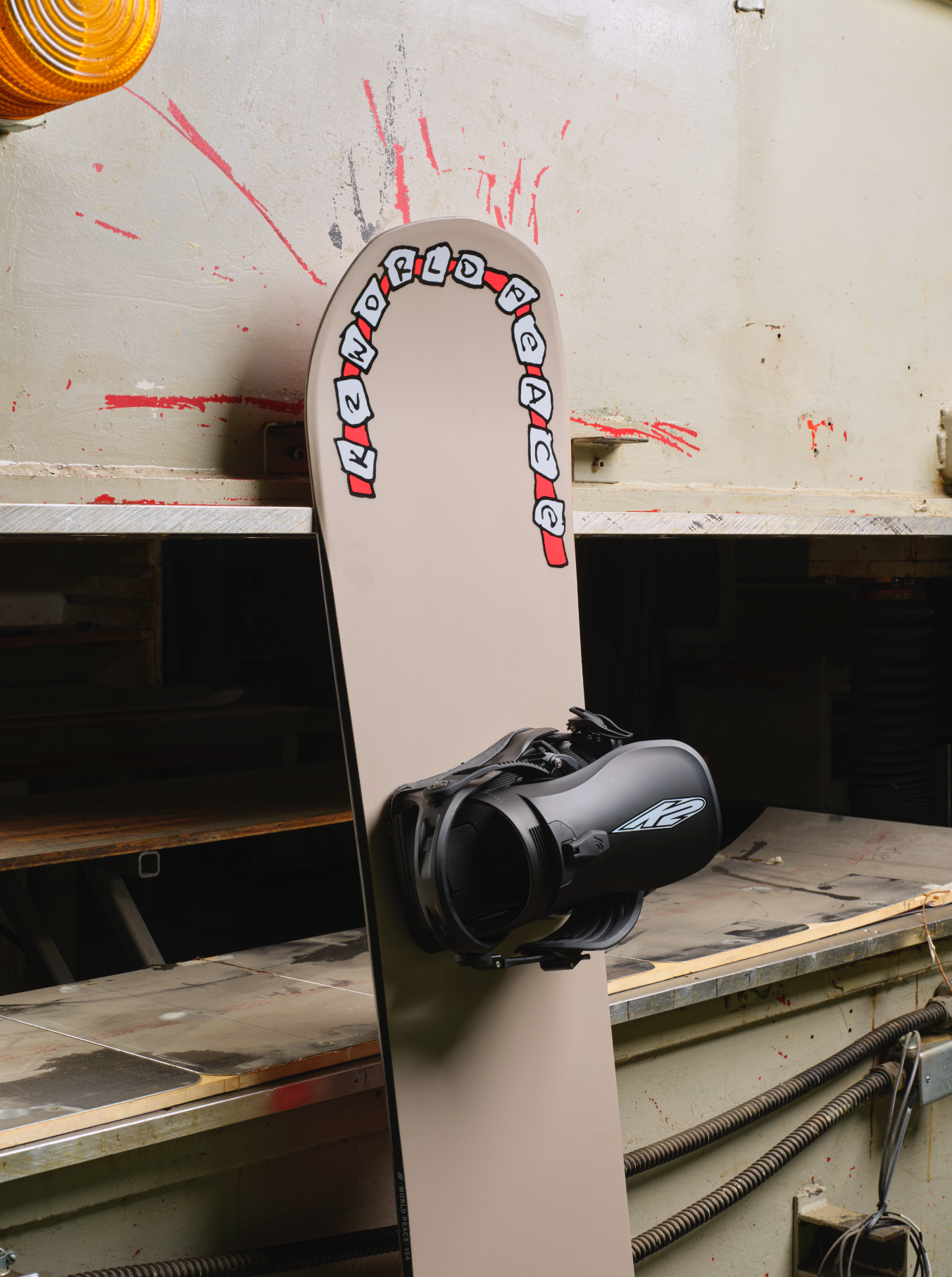K2 World Peace Snowboard 2027 with detailed nose design, showcasing the snowboard's craftsmanship and vibrant graphics.