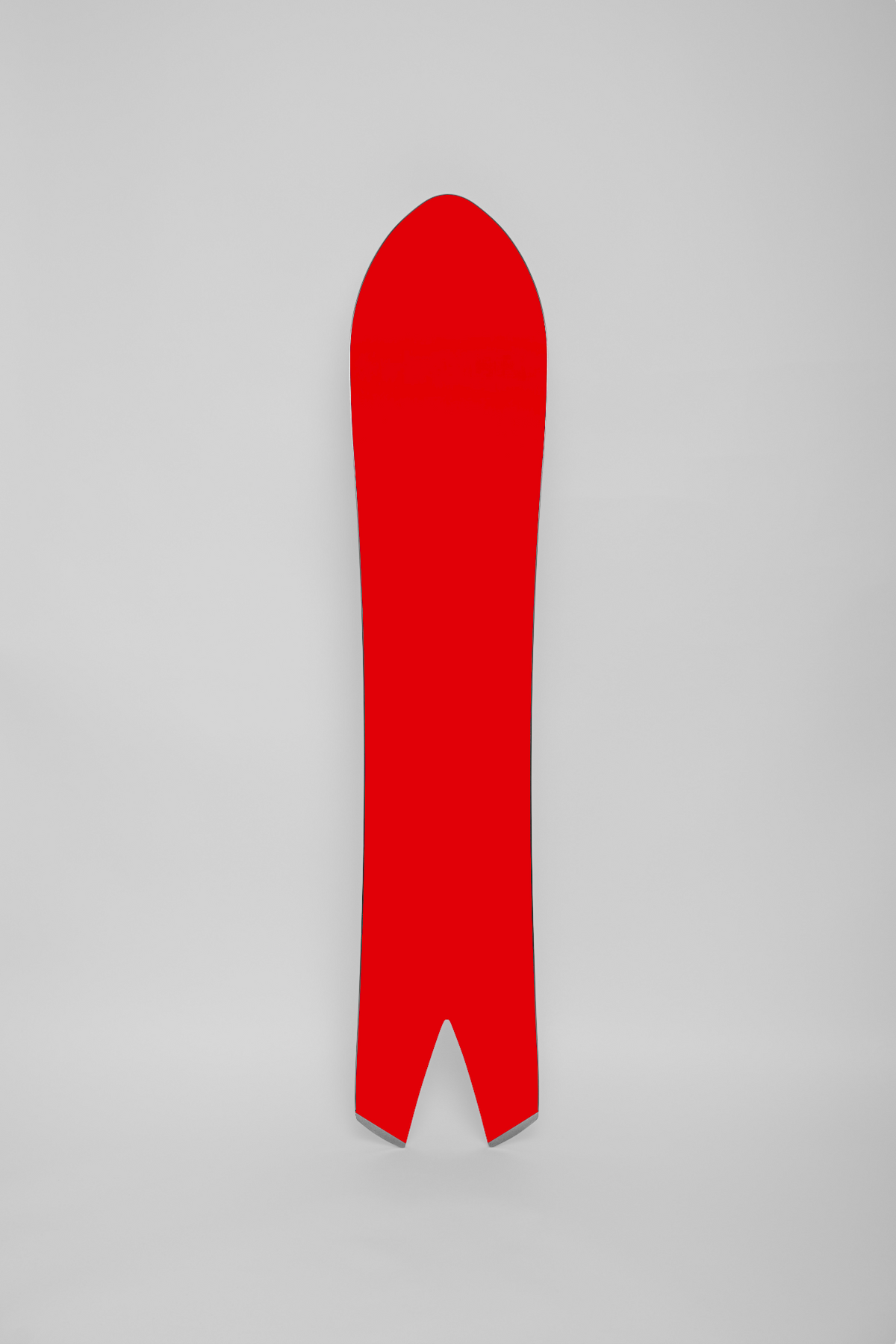 Korua Dart snowboard with a colorful base design, perfect for snowboarding enthusiasts seeking high-performance gear.