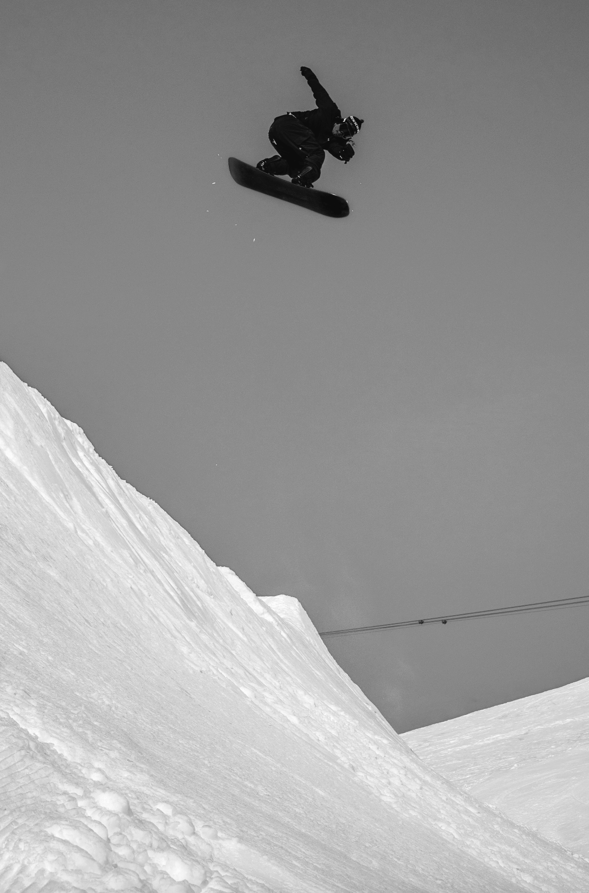 Korua Otto Plus snowboard for snowboarding, featuring a sleek design and durable construction, shown in a shifty pose.