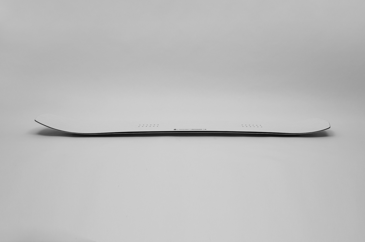 Korua Transition Finder snowboard shown from the side camber view