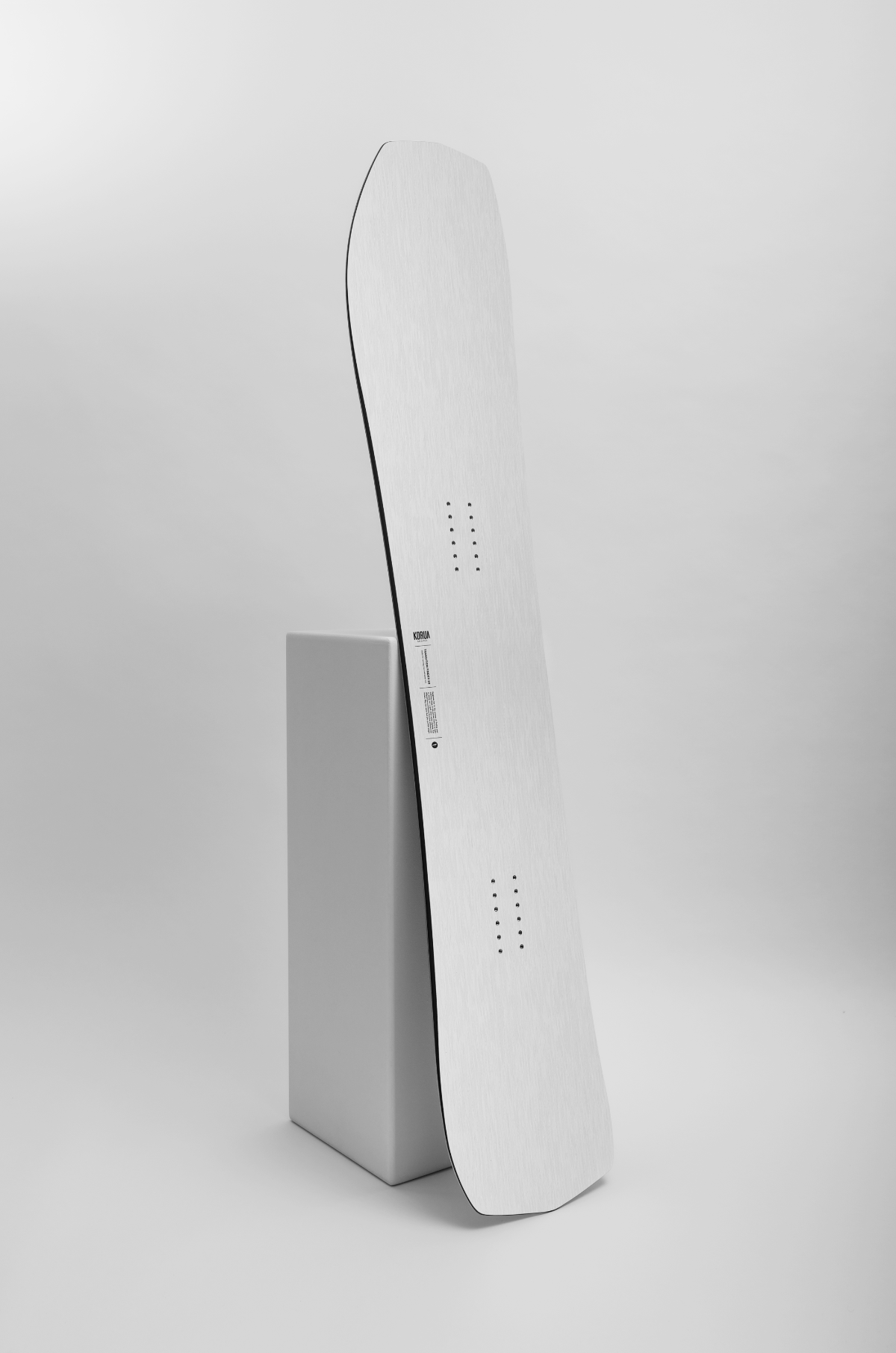 Korua Transition Finder snowboard in a studio setting