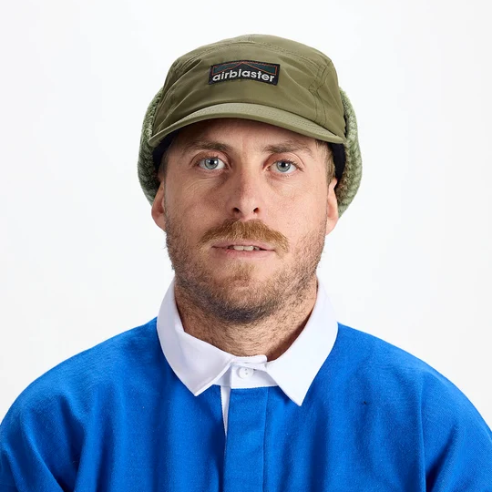 Airblaster Air Flap Cap 2027 in Olive shown from the front with Airblaster logo patch and fleece-lined ear flaps down.