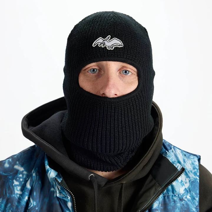 Airblaster Terryclava 2027 in Black shown from the front with rib-knit balaclava construction, face opening, neck coverage and Airblaster bat logo patch.
