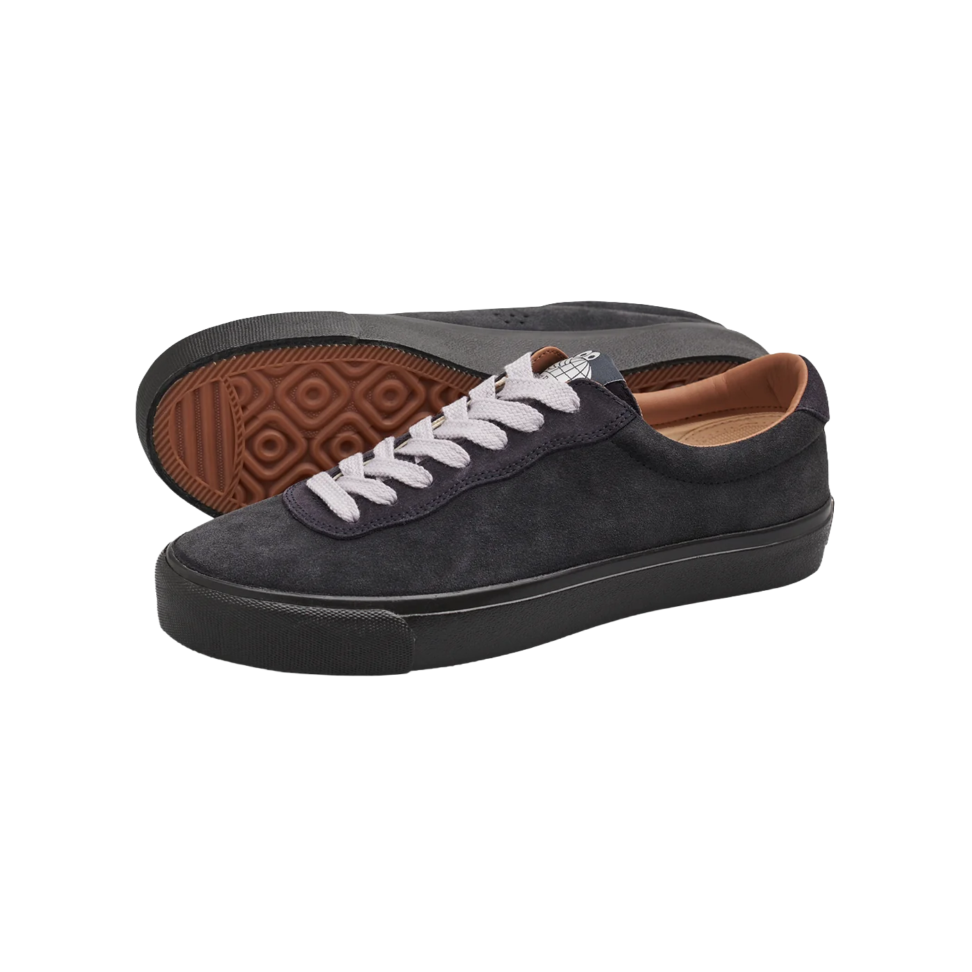 Pair of Last Resort AB VM001 Lo Suede skate shoes in Grape Magnet and Black shown from a three-quarter angle with gum outsole visible.