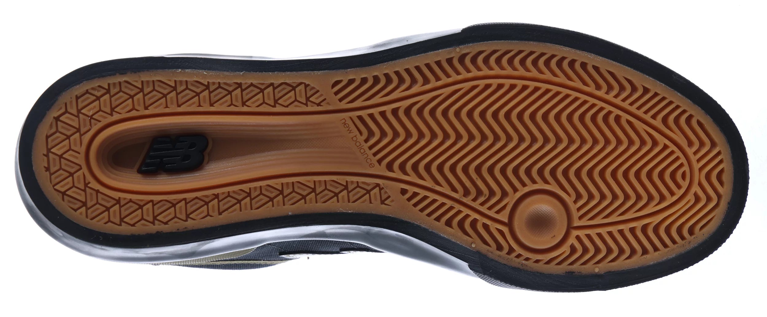 Bottom view of the gum rubber outsole and herringbone traction pattern on the New Balance Numeric 272 skate shoe.