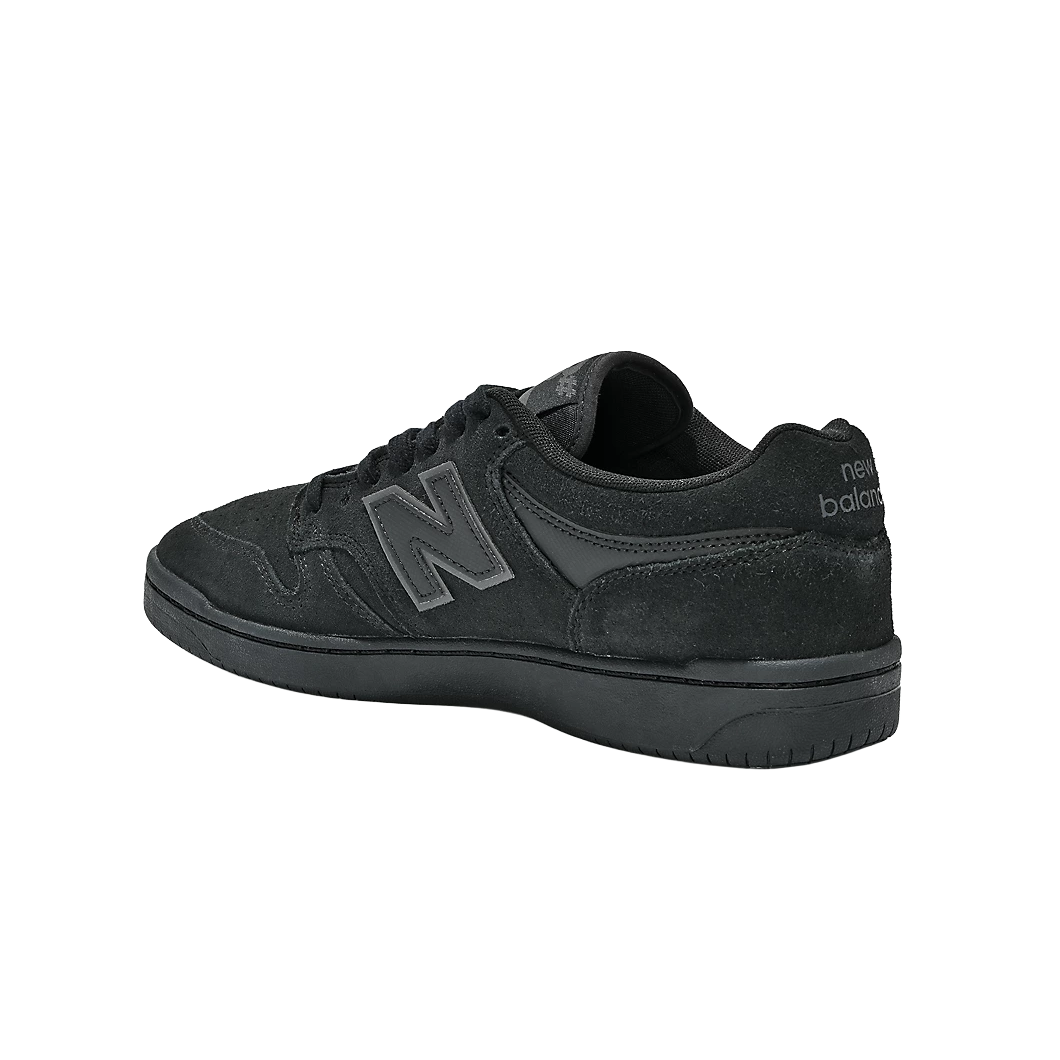 Rear three-quarter view of the New Balance Numeric 480 Black and Black skate shoe showing the suede heel and New Balance branding.