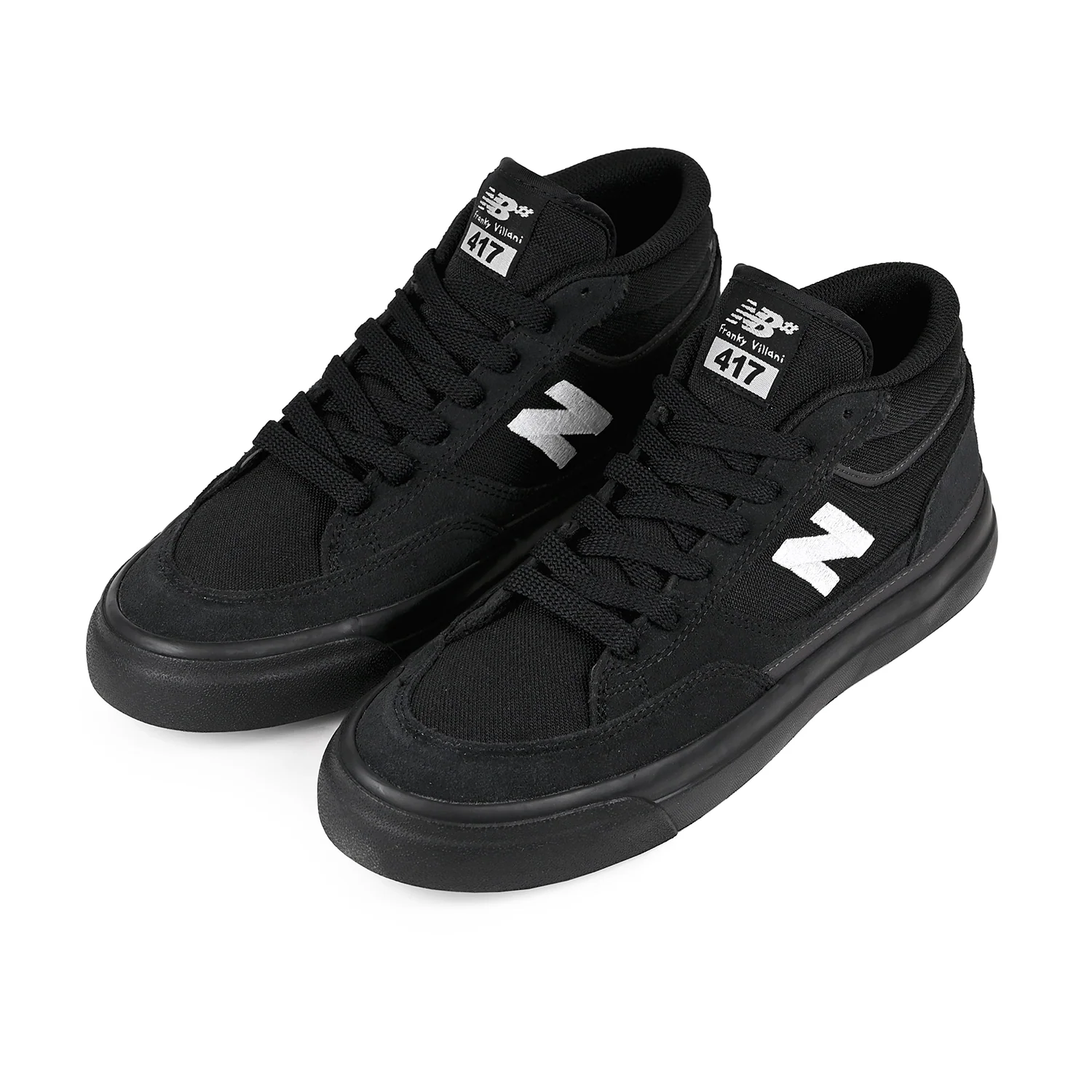 Pair of New Balance Numeric Franky Villani 417 skate shoes in black and black shown from a front three-quarter angle with white N logos and black soles.