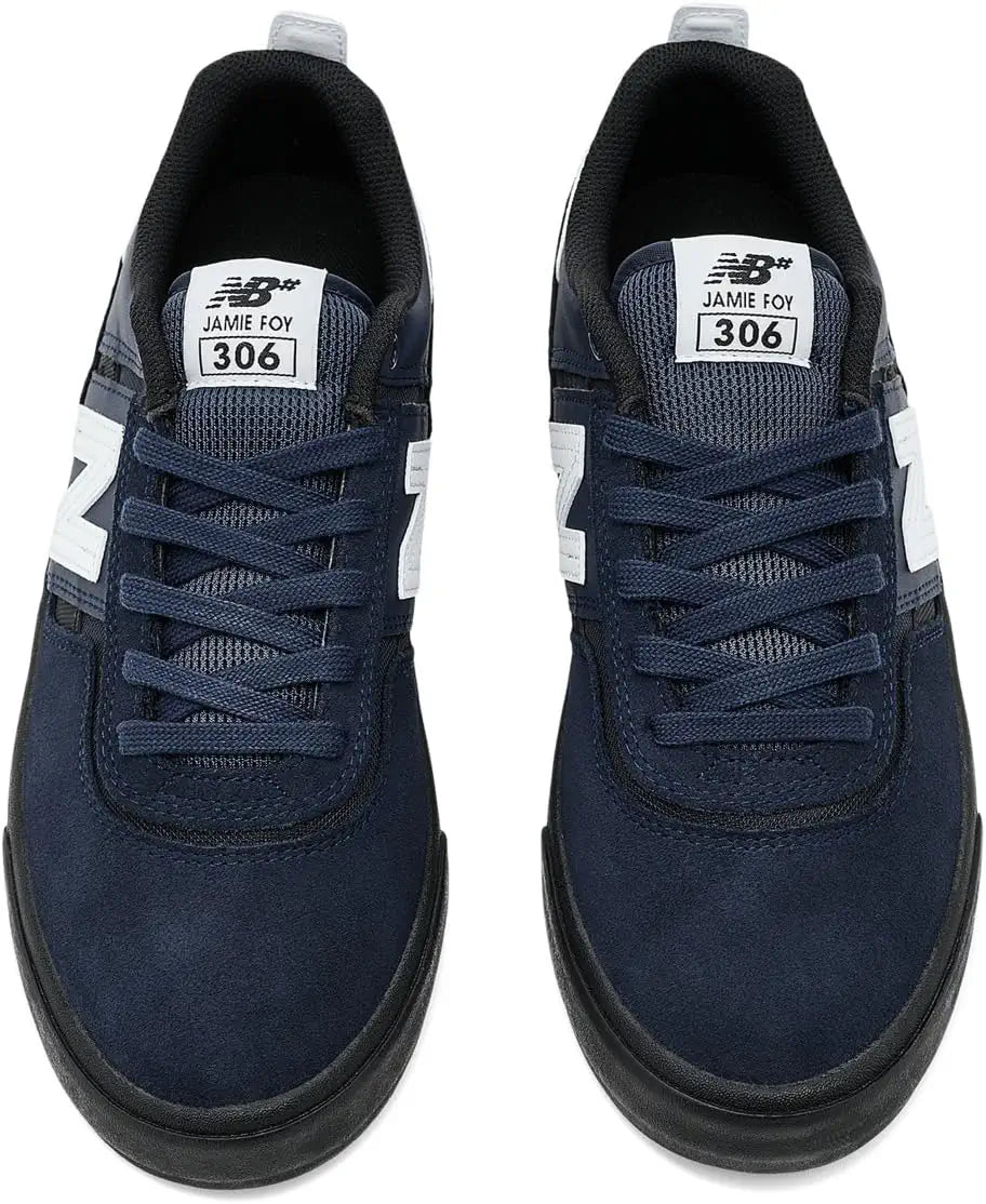 op view of a pair of New Balance Numeric Jamie Foy 306 skate shoes showing navy laces, suede toe boxes, mesh tongues and Jamie Foy 306 tongue labels.