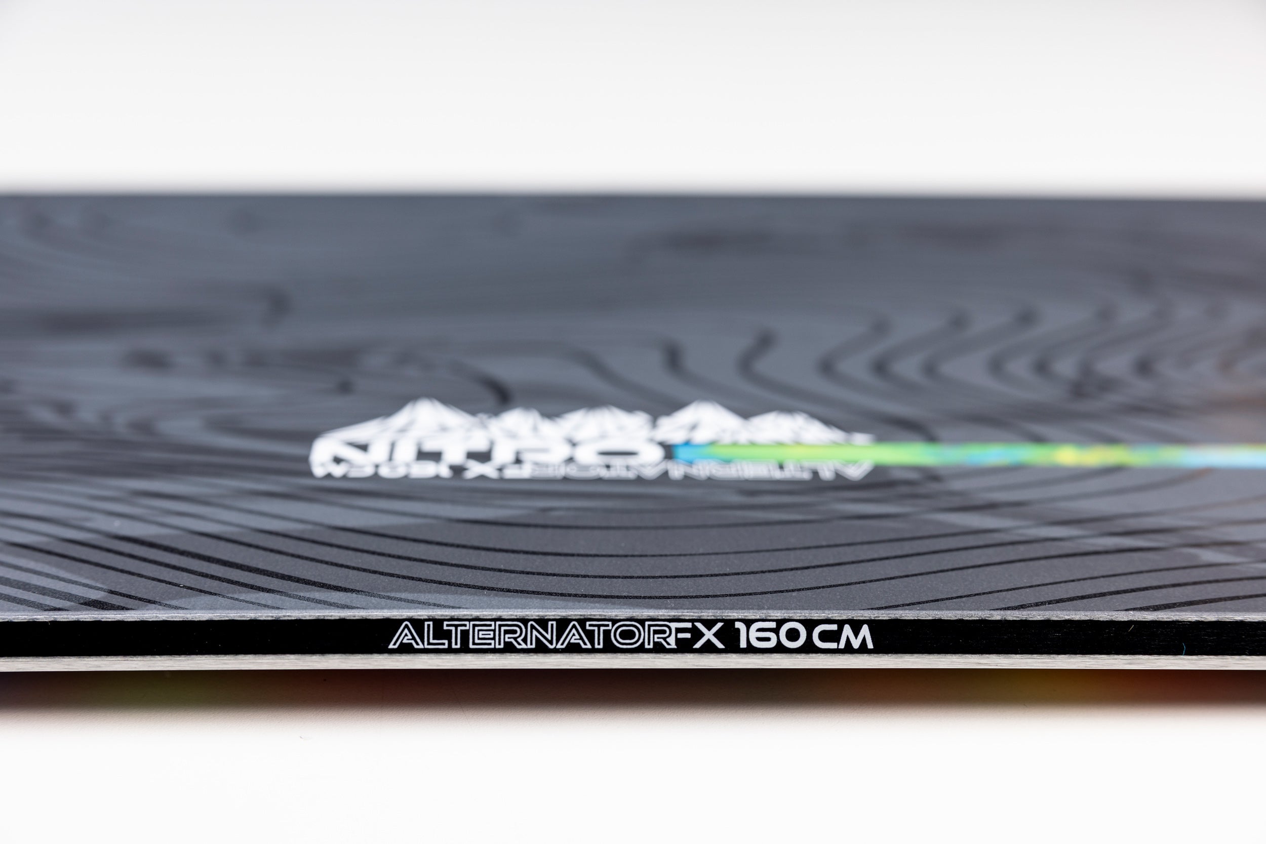 Side view of Nitro Alternator FX Snowboard 2027 showing the snowboard's sidewall and size details, featuring Nitro branding.