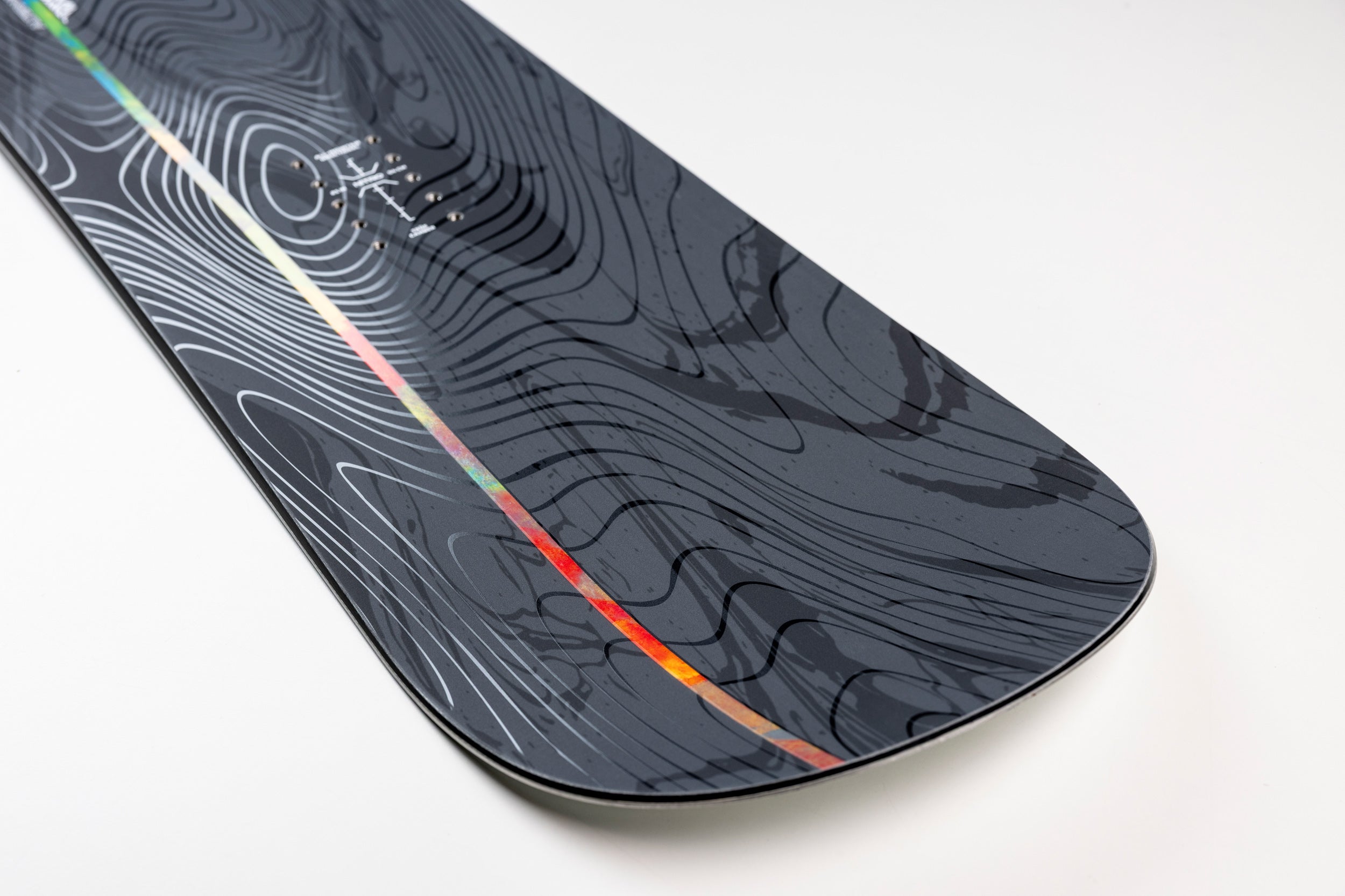 Nitro Alternator FX snowboard 2027 with tail center stripe, showcasing the sleek design and graphic detail on the snowboarding product.