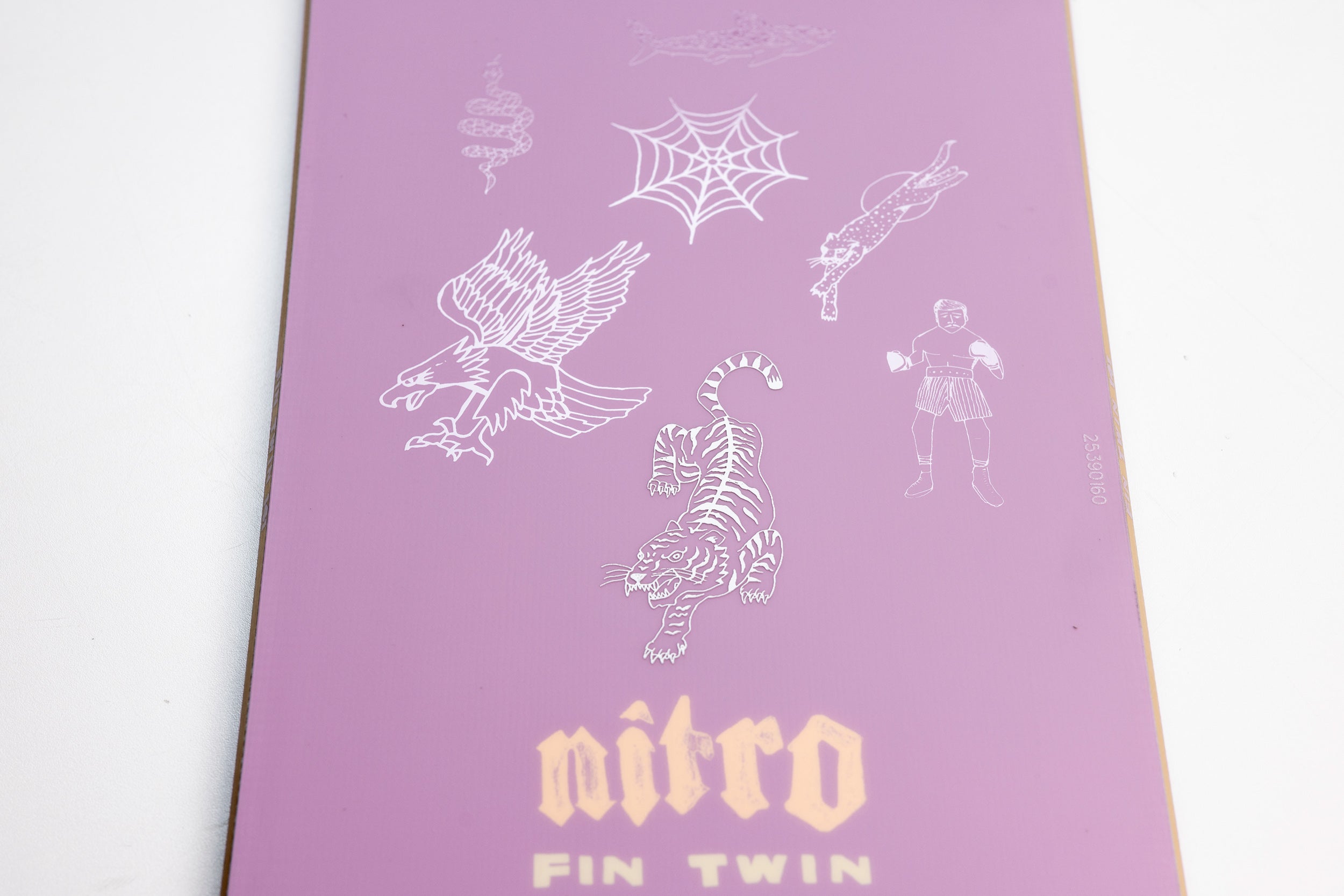 Nitro Fin Twin Quiver Series Snowboard 2027 with detailed artwork, designed for snowboarding adventures.