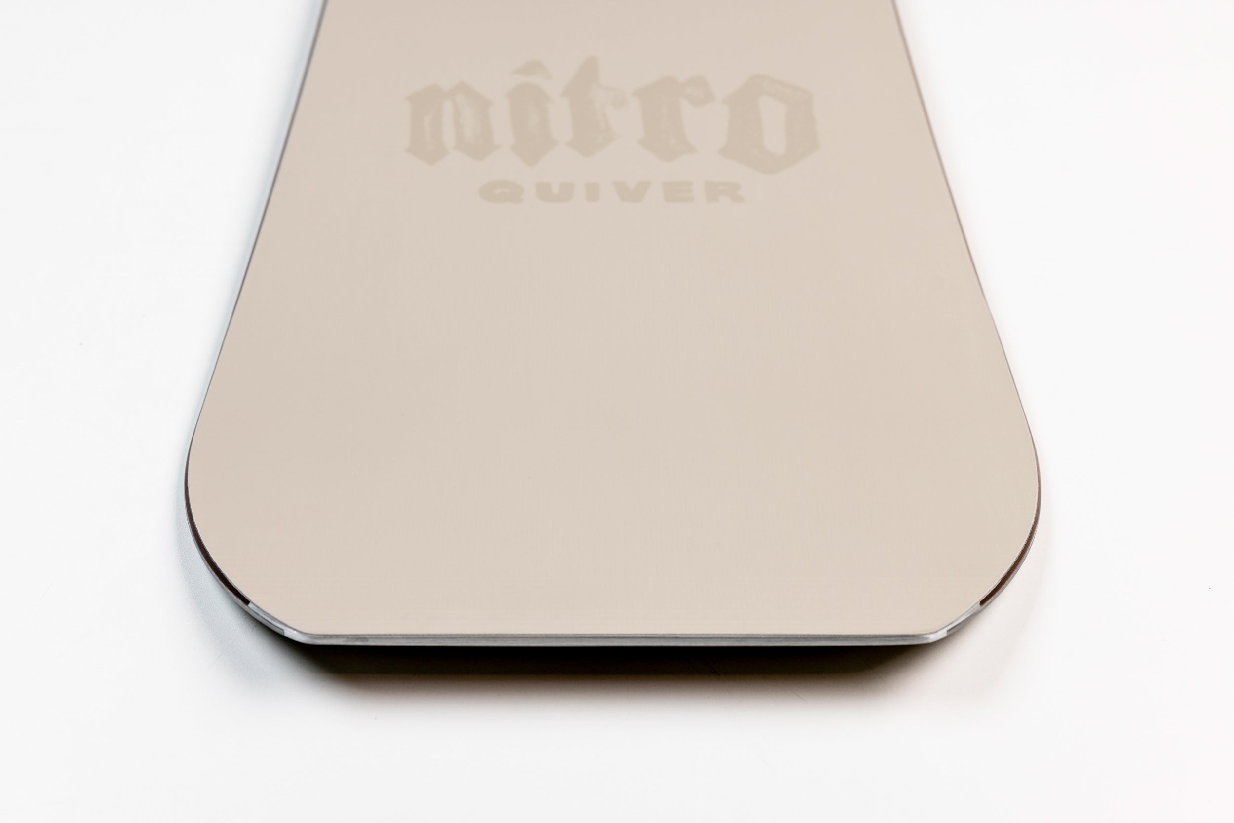 Close-up of the tail of Nitro Mastercarve Quiver Series Snowboard 2027, showcasing its design and craftsmanship.